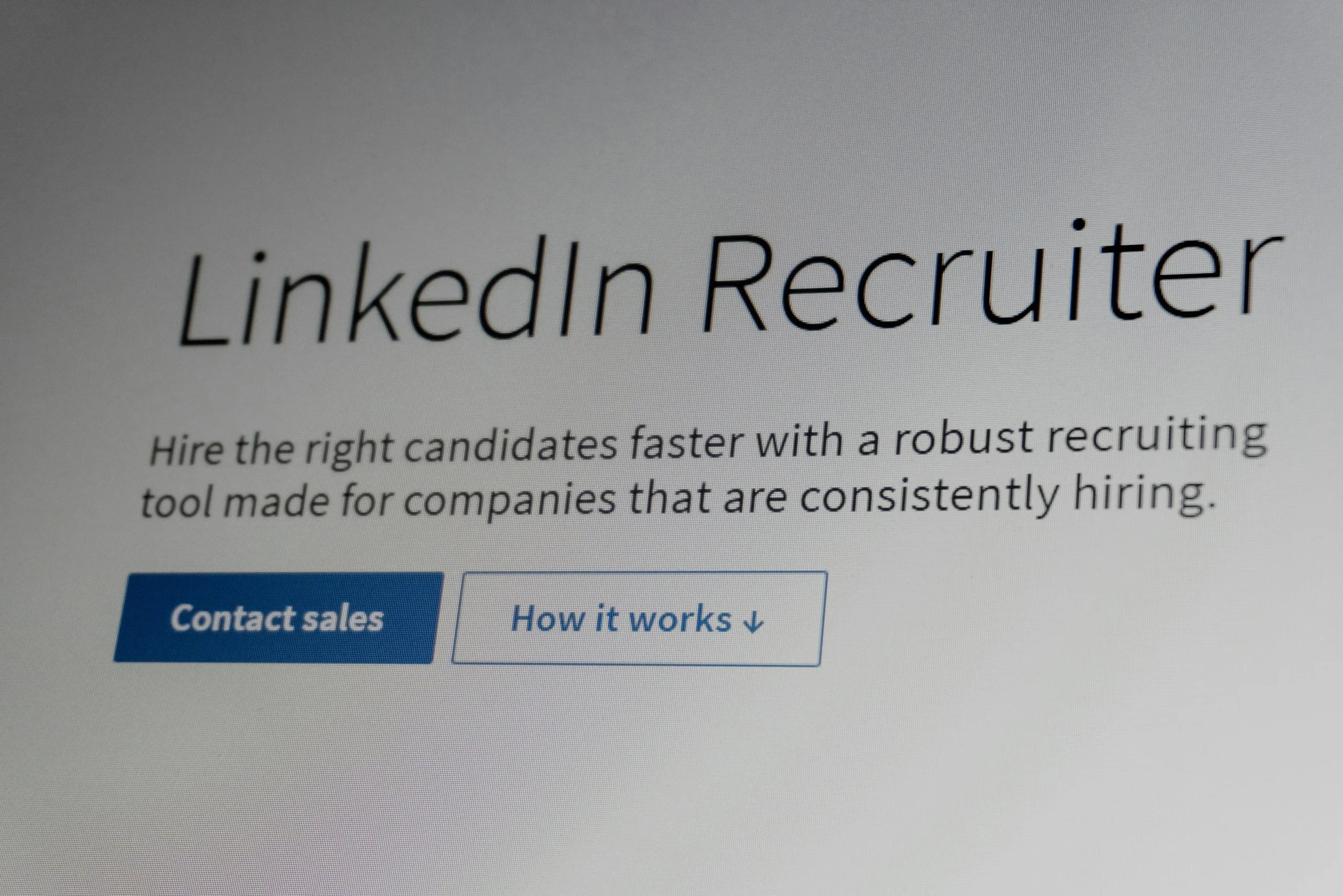 LinkedIn Recruiter webpage with headline and two buttons labeled 'Contact sales' and 'How it works'.
