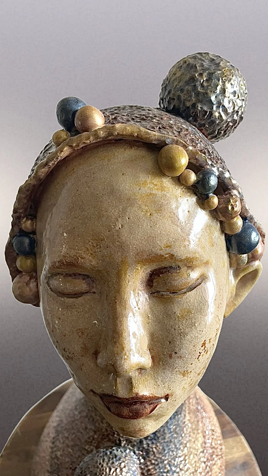 "Melancholia". H40 x W26 cm. Stone clay, engobes, glazes, overglazes. Cone 10 (1280*C) oxidation. 2024, December