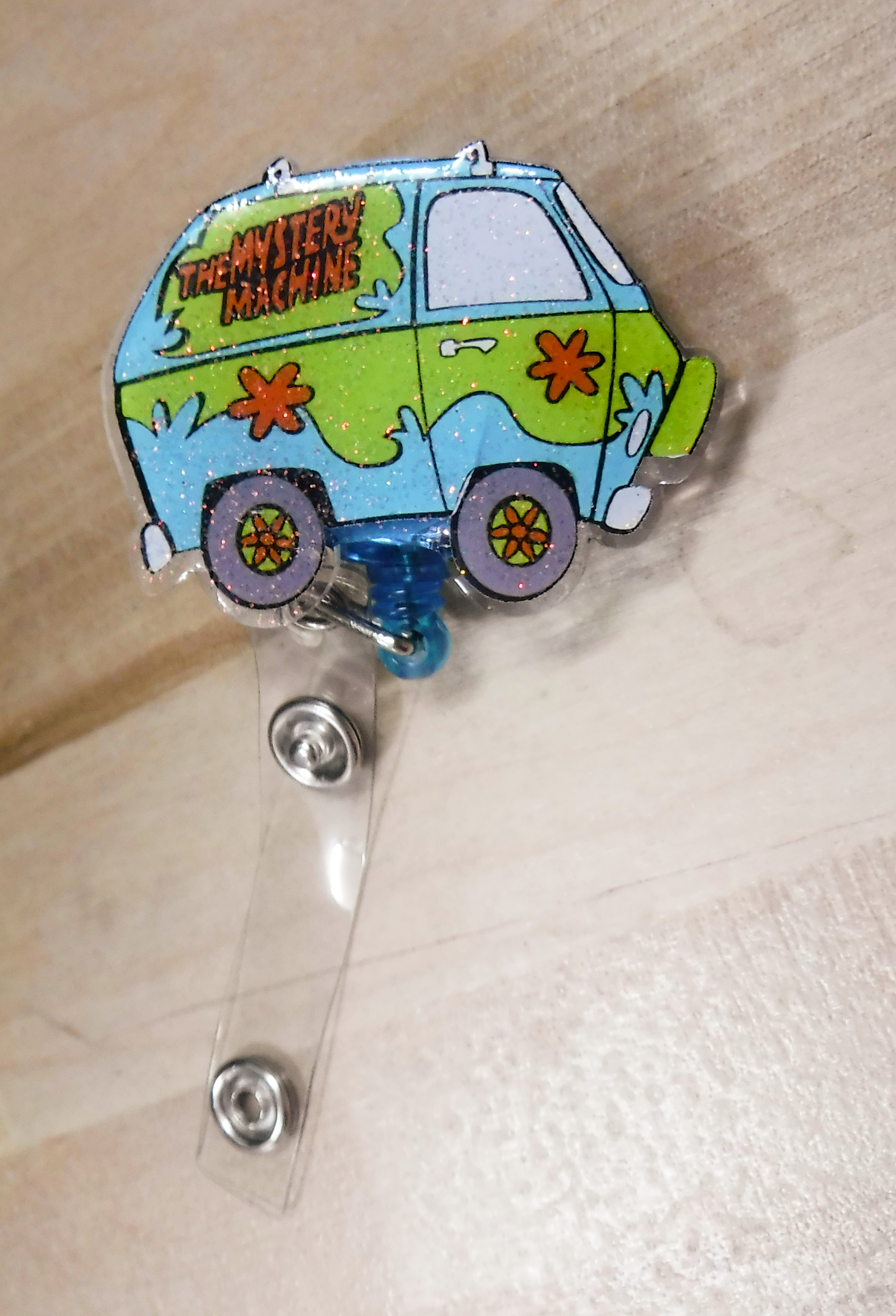 badge-reel_scooby van.png