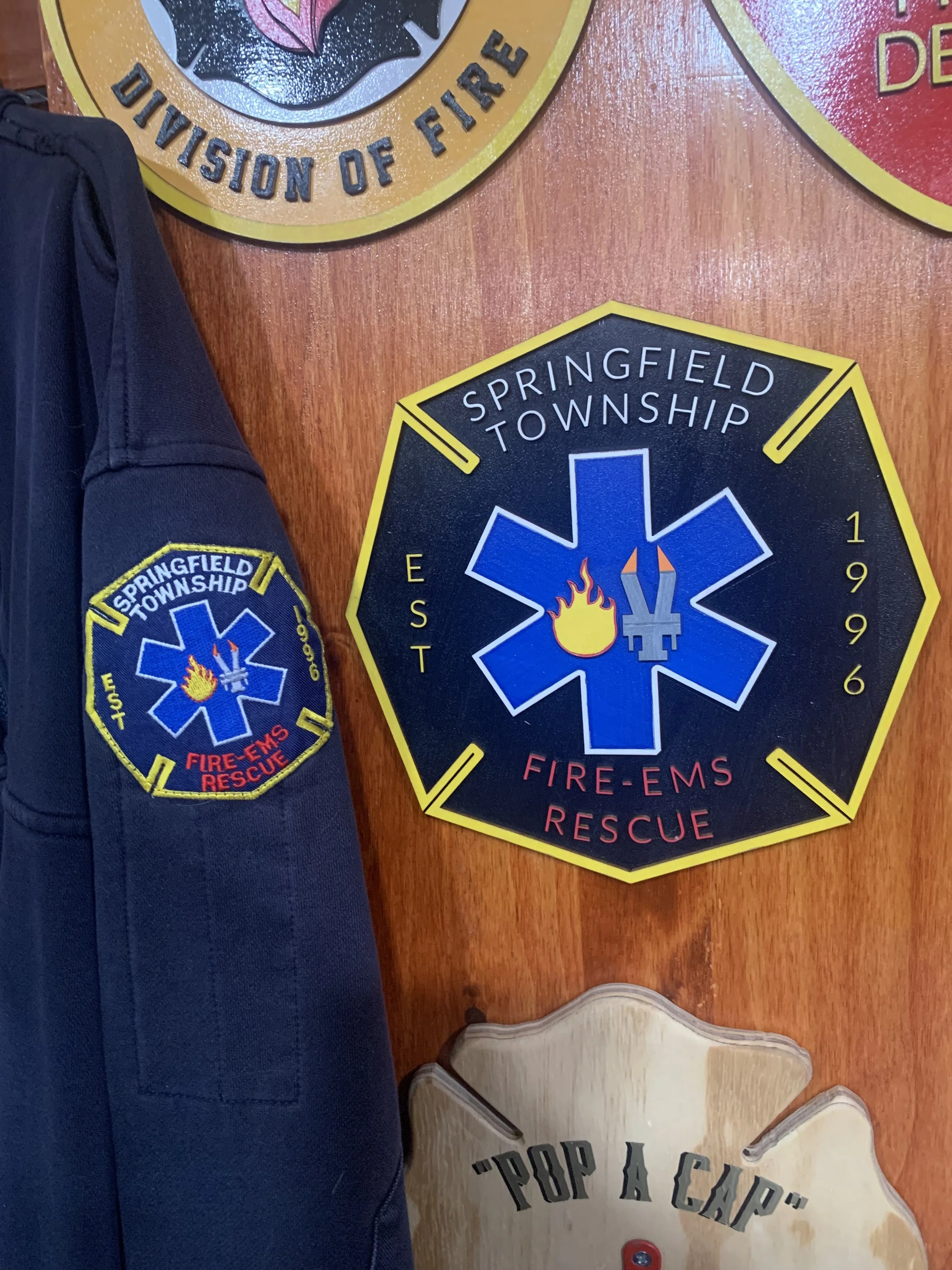 Multi-layered sign made from a fire department patch