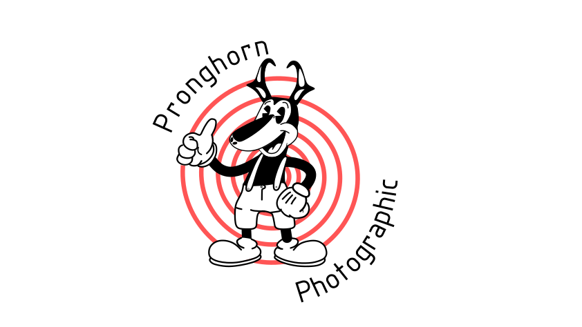 Cartoon character of a pronghorn, standing with one hand on its hip and the other giving a thumbs-up, with red concentric circles in the background.