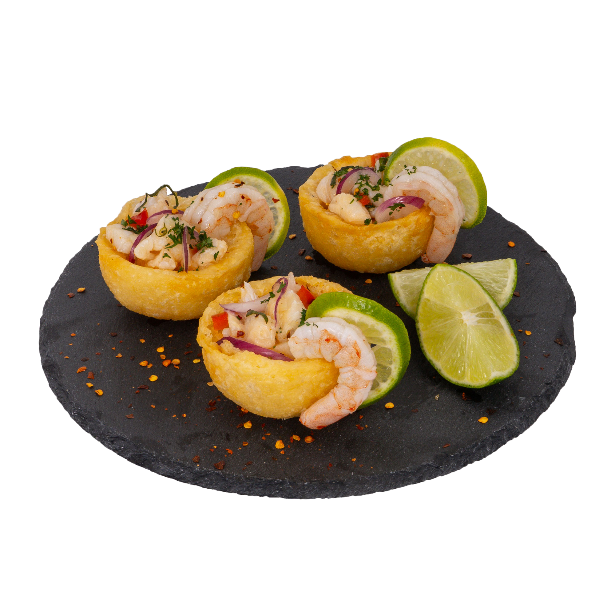 Tortillas rellenas de langosta, cebolla morada, cilantro y limón en plato de piedra.