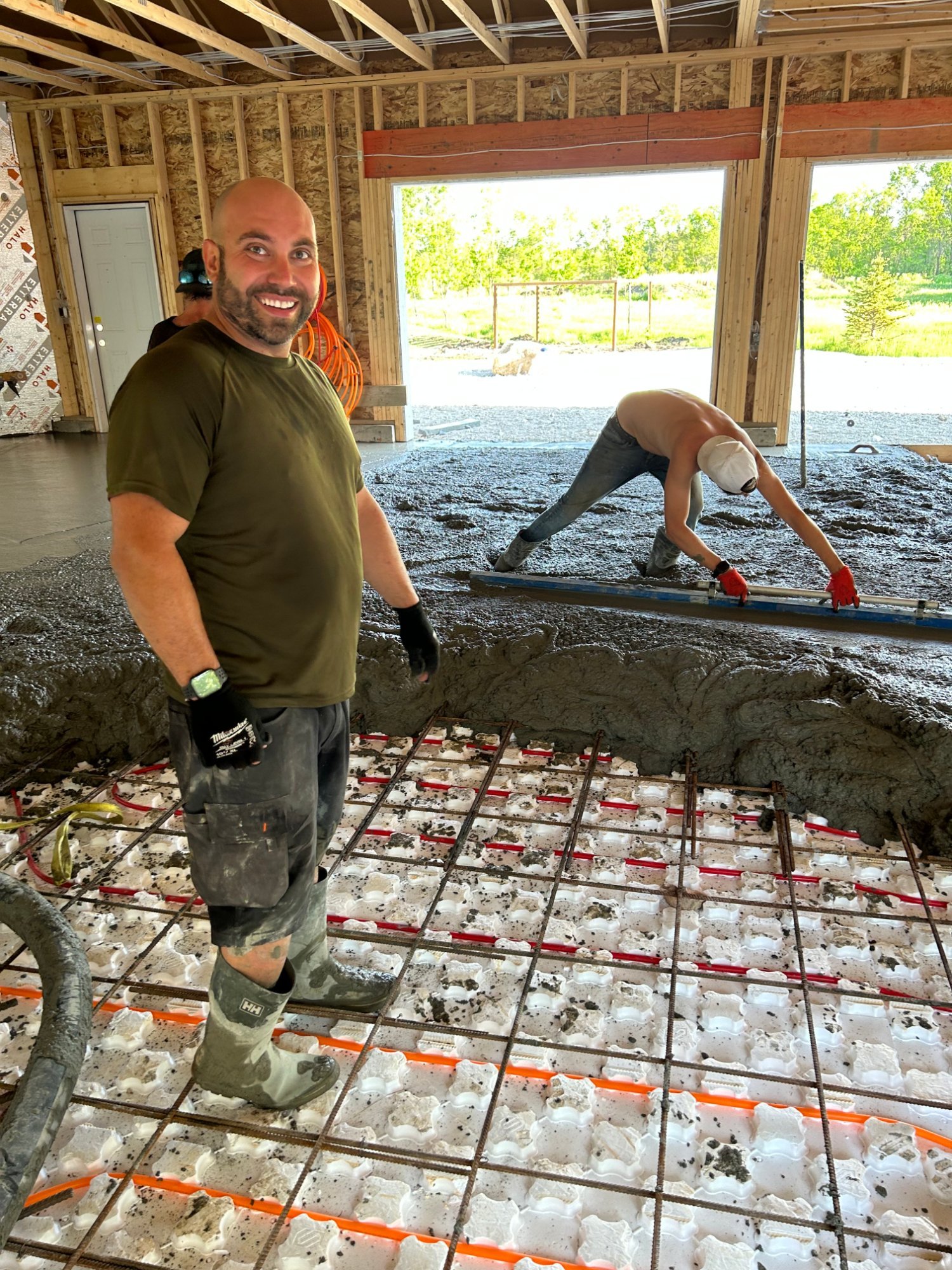 hyde-park-owner-justin-garage-floor-pour-birds-hill.jpg