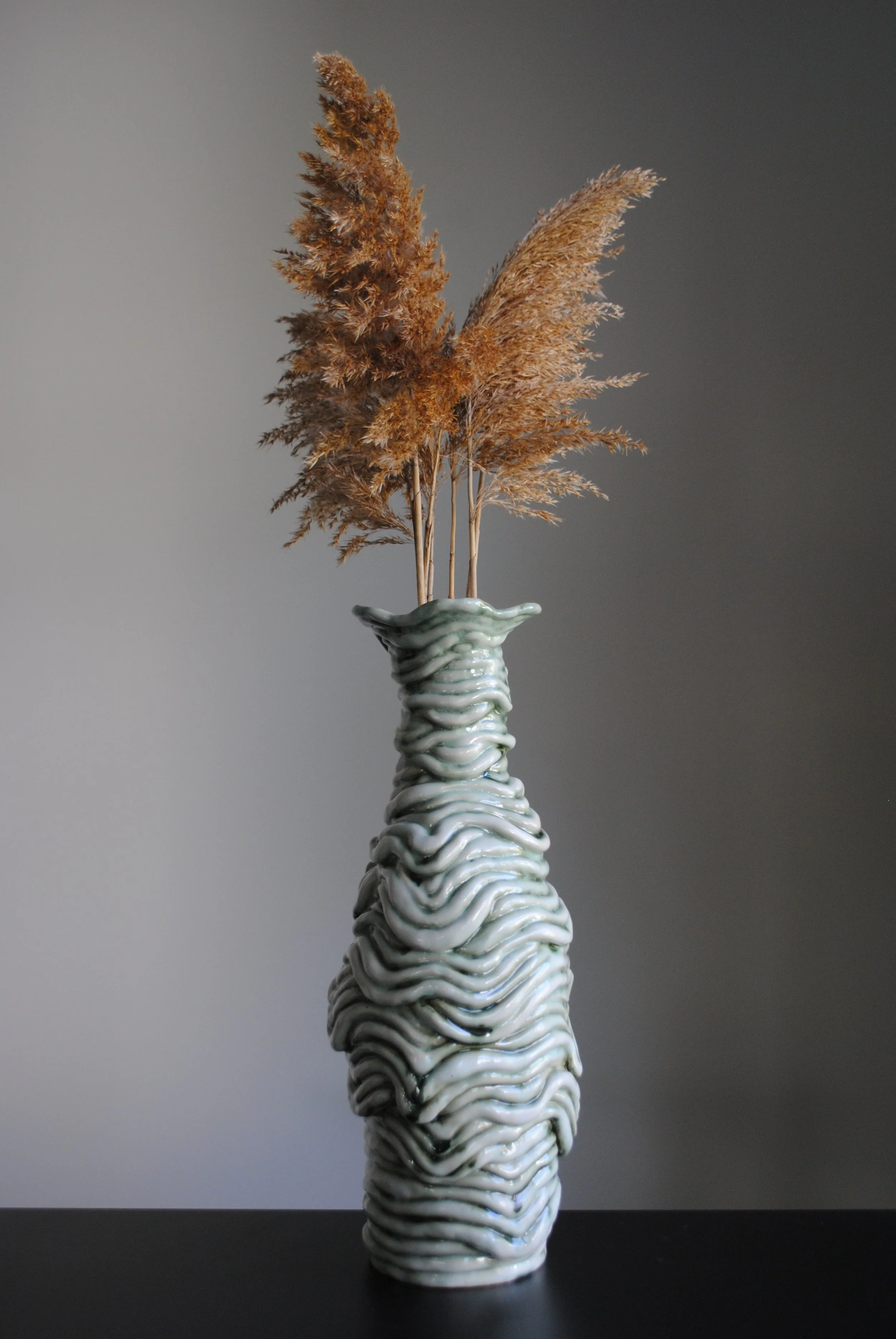 Keep It Together, 2026
Stoneware Clay, Copper Oxide Glaze
16" x 5" x 5"