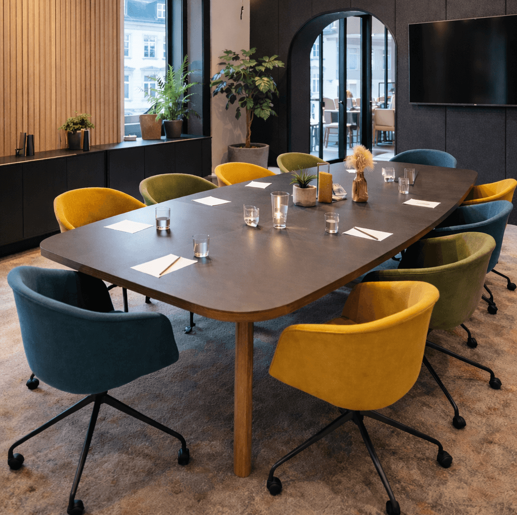 Modern meeting room at Nomad Workspace set up for a leadership event.