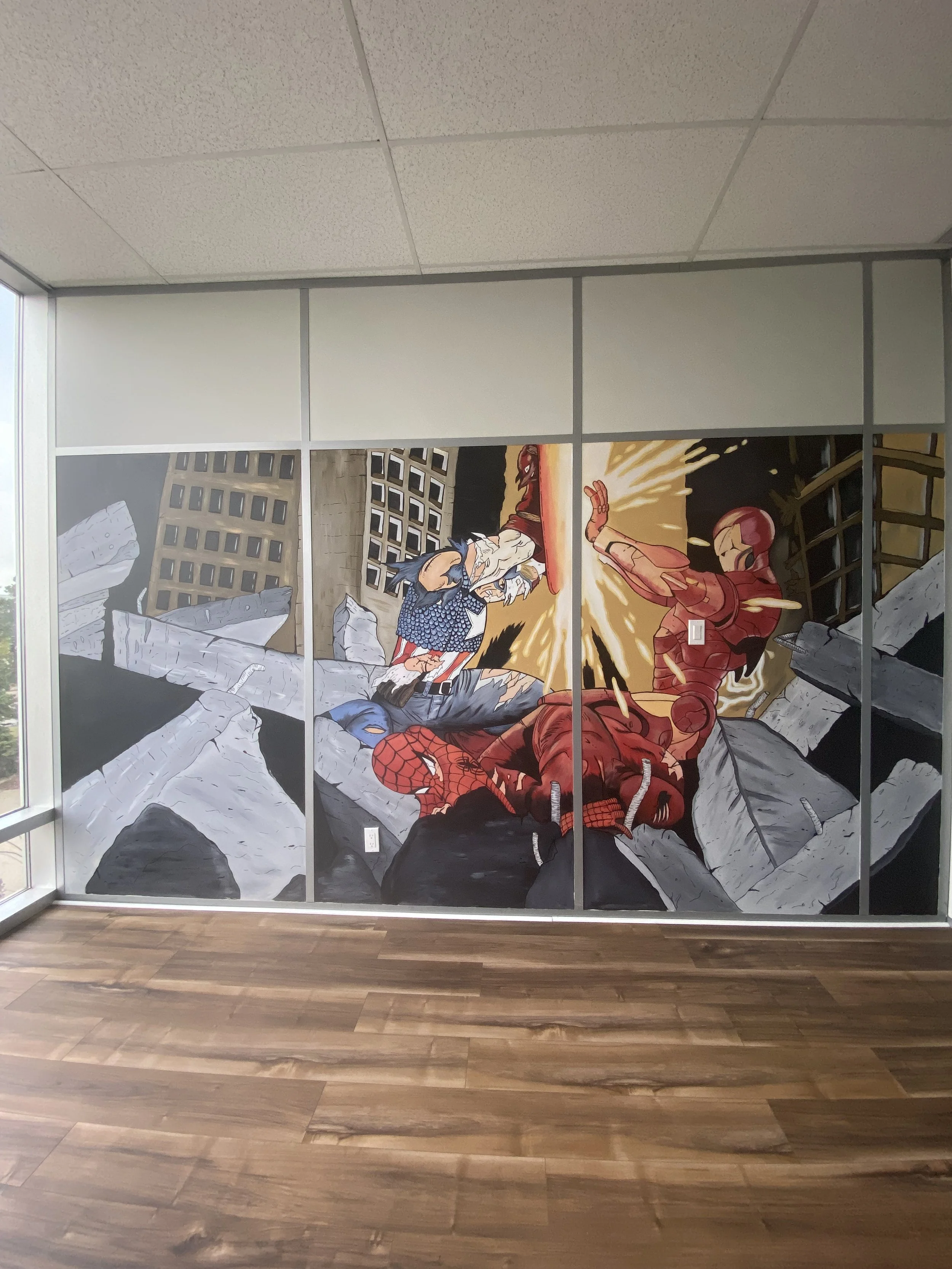 Comic book style mural depicting superheroes Spider-Man and Iron Man battling destructive giant stone creatures in a city setting with buildings and rubble.