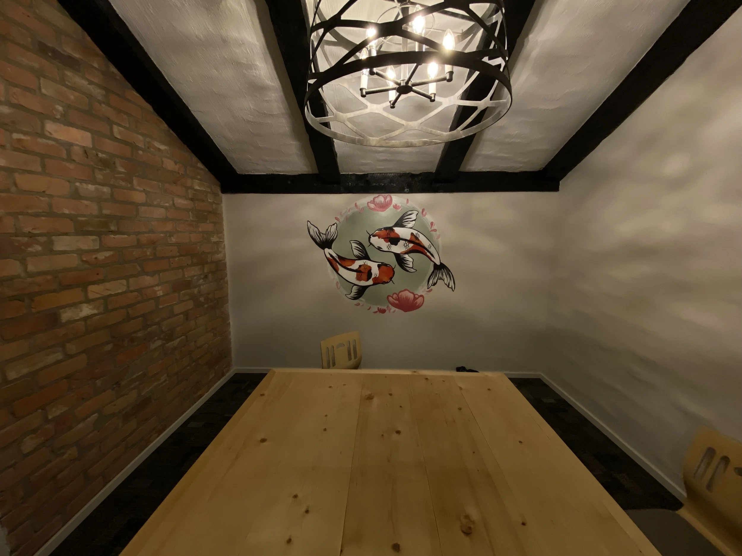 Hand painted Koi Fish with flowers located at Sushi Toshiba South Edmonton private room