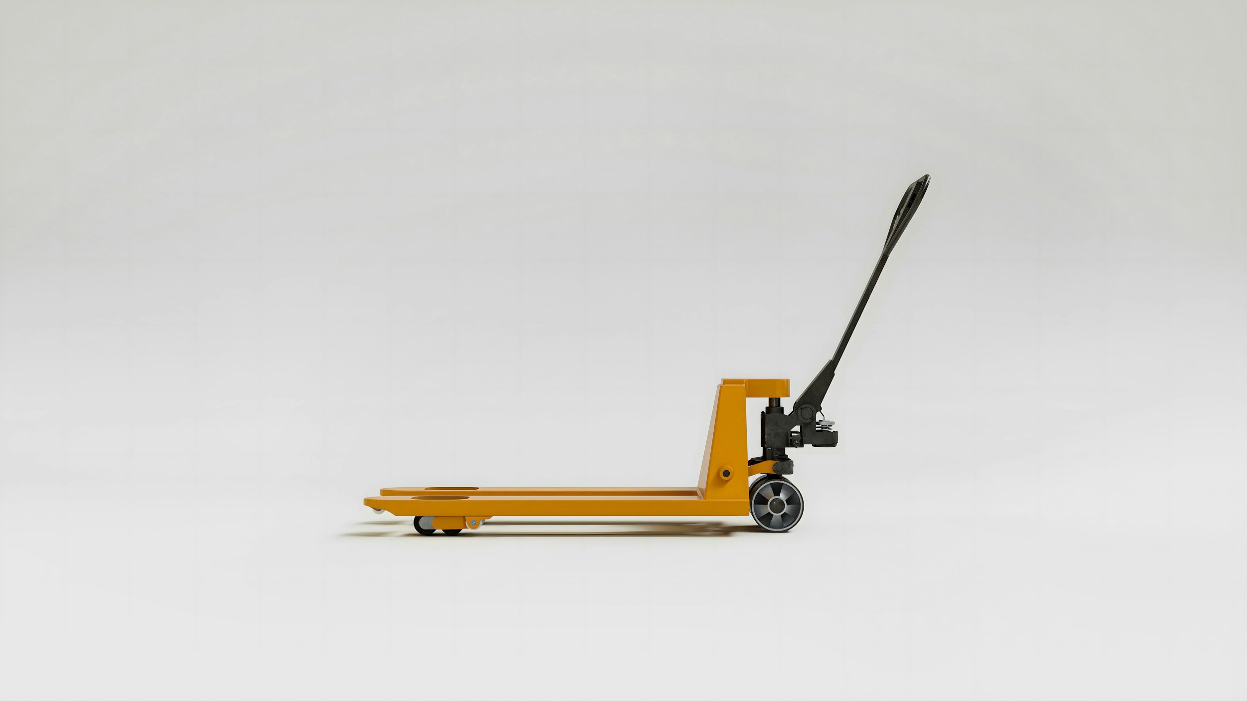 Yellow pallet jack with black handle against a plain white background.