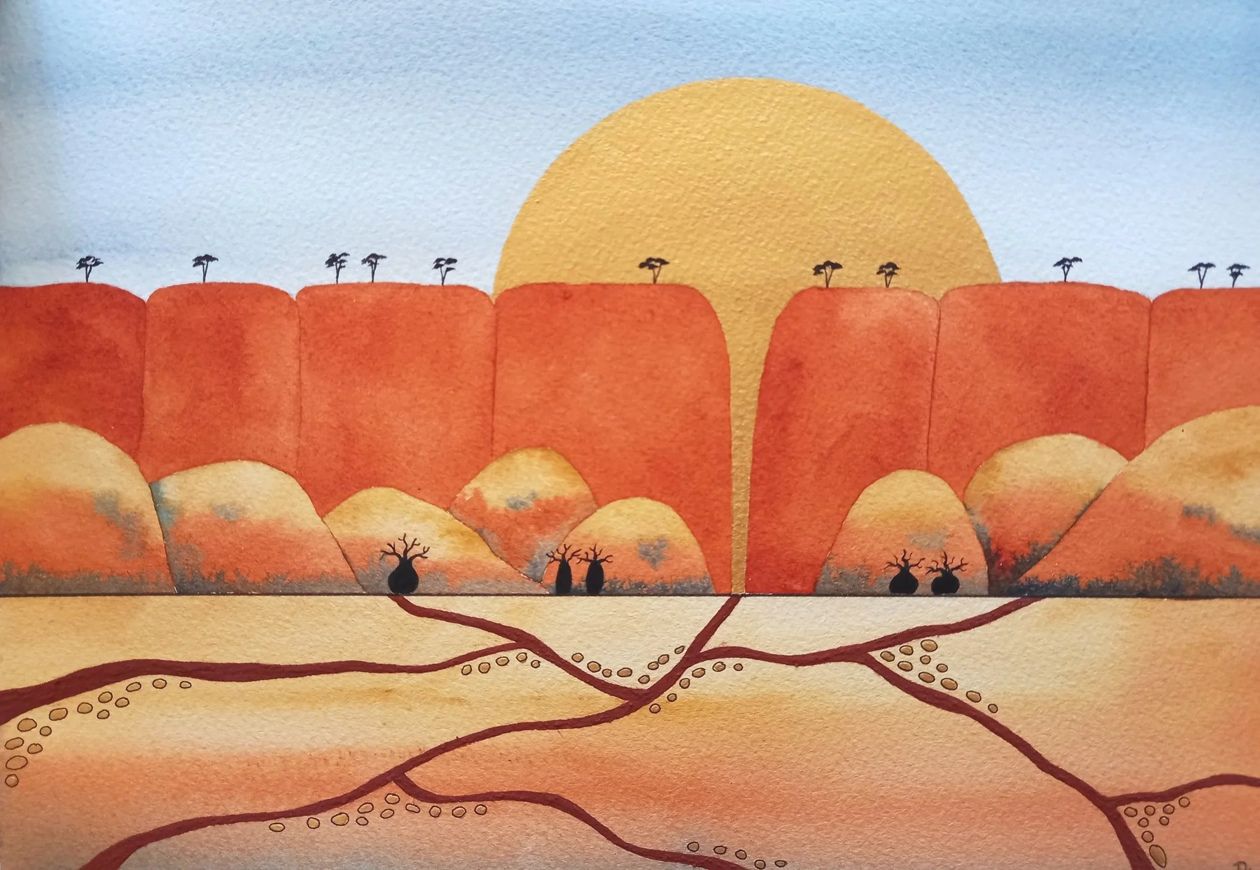 A watercolor painting of a landscape with orange hills, small trees, and a large yellow sun setting or rising in the background, with a blue sky.