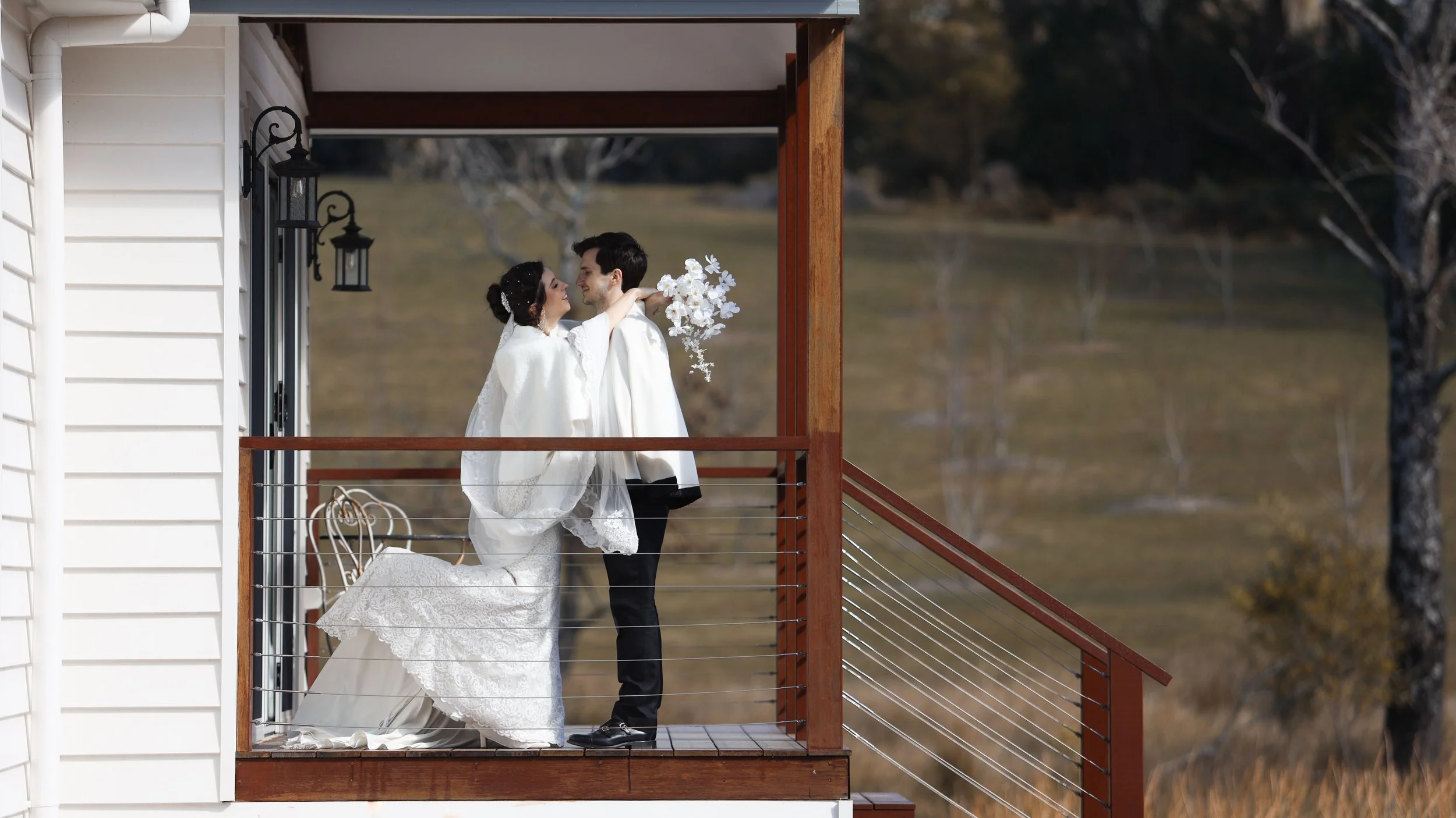 Bride and groom kissing at Chapel Hill 