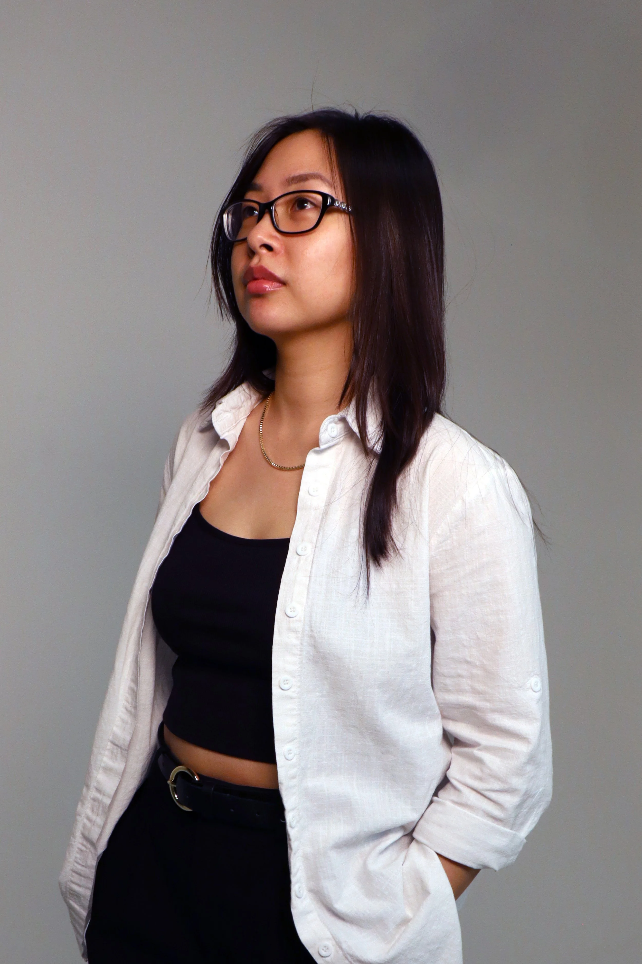 headshot image of Tracey Mei, at 3/4 view
