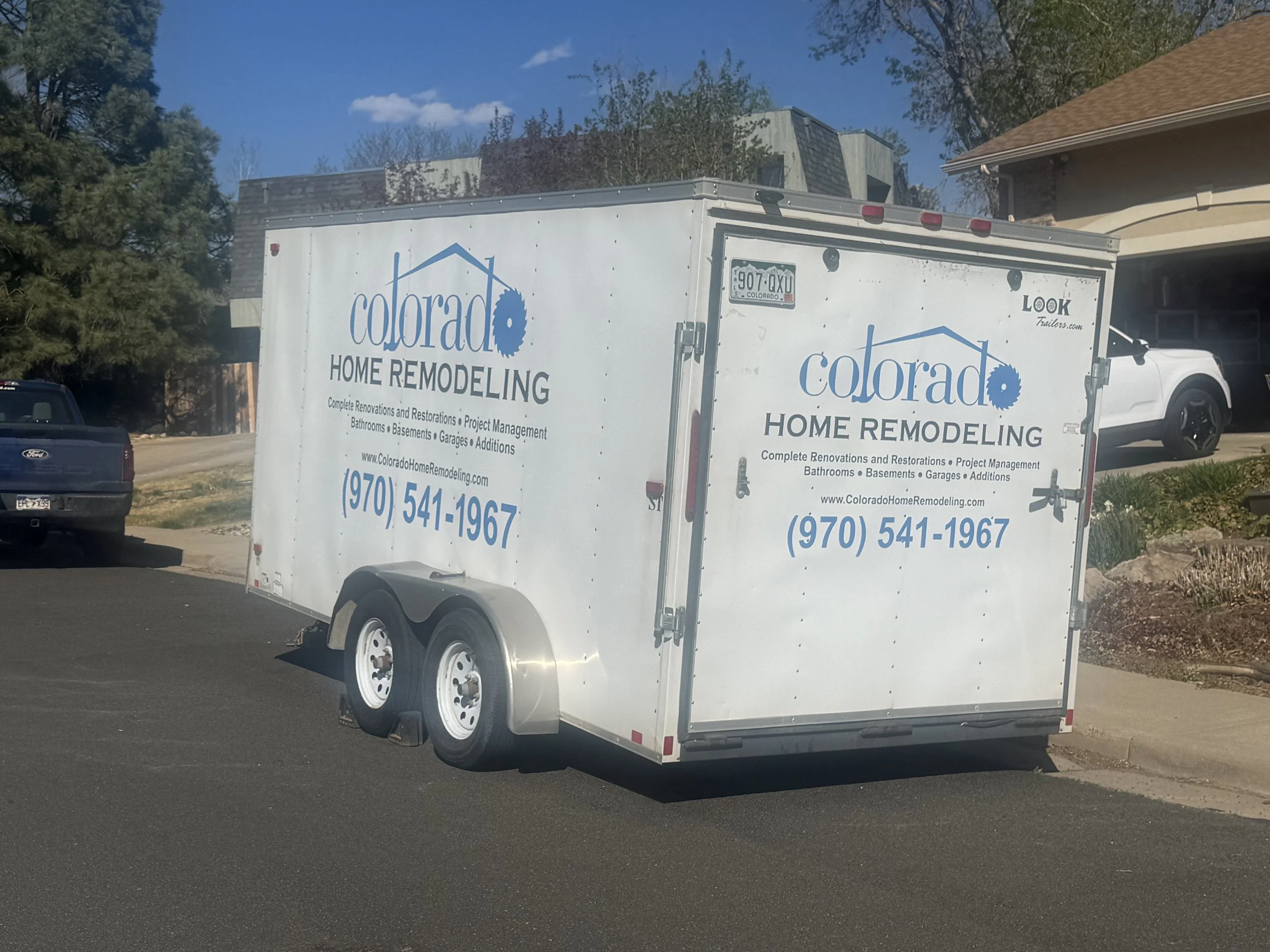 Enclosed contractor trailer serviced by Top Tier Equipment Repair after electrical brake repair