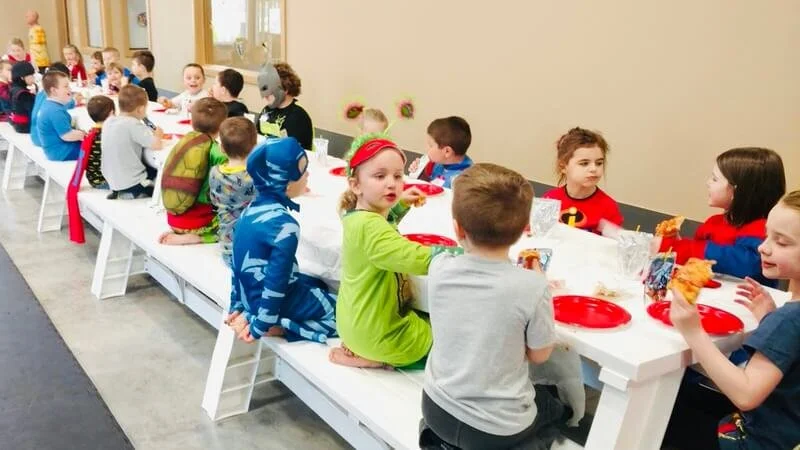 Group of children celebrating birthdays at a Karate John's Martial Arts birthday party in Cicero, NY and Liverpool, NY.