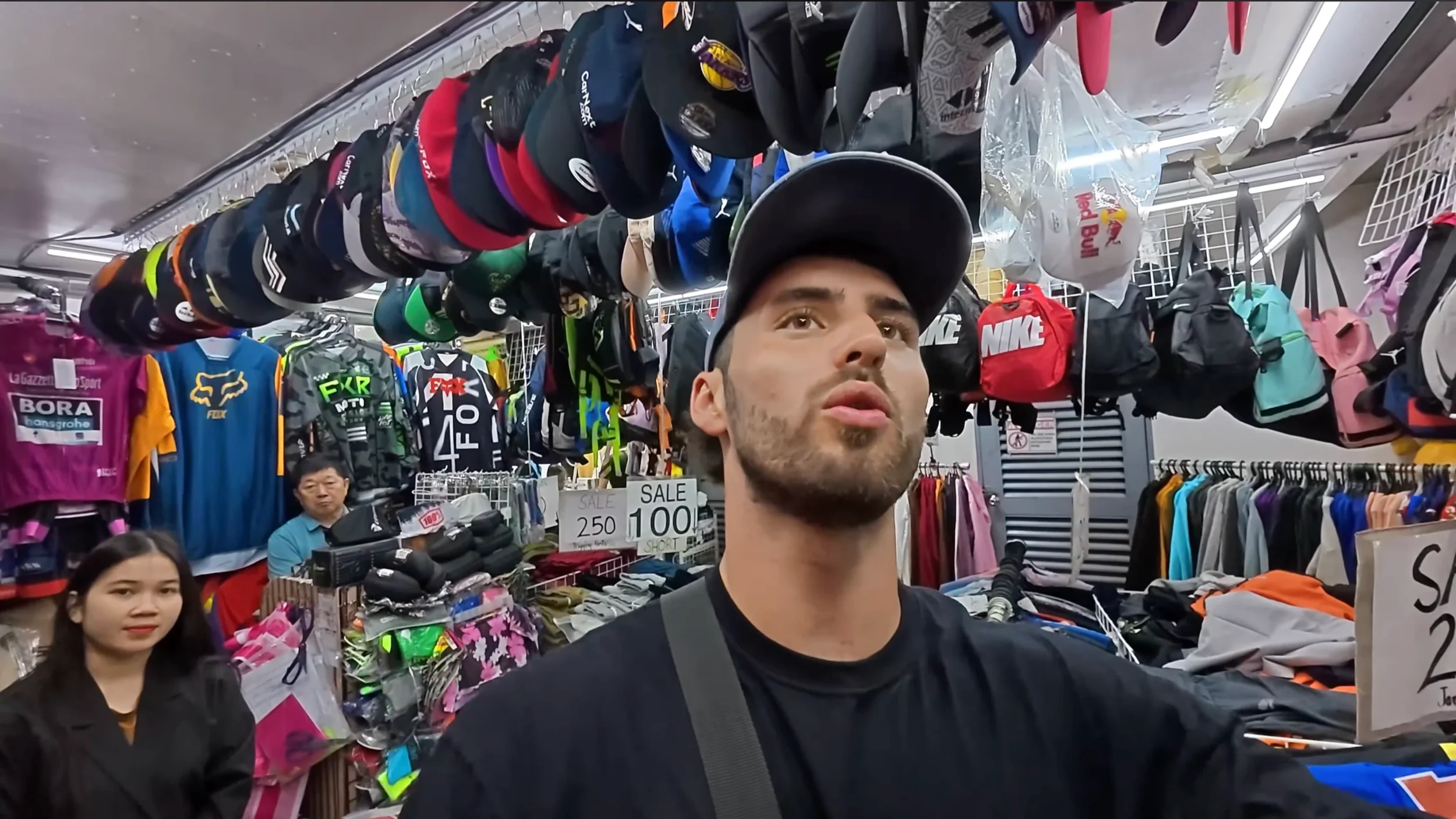 Inside the store selling NBA jerseys in a Manila market