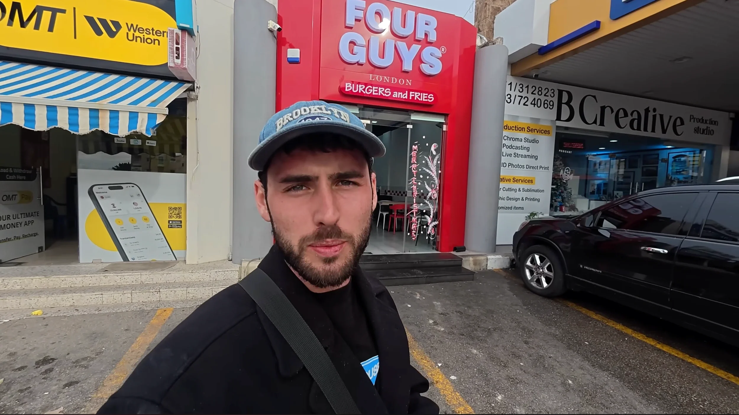 In front of the ‘Four Guys’ Restaurant in Lebanon