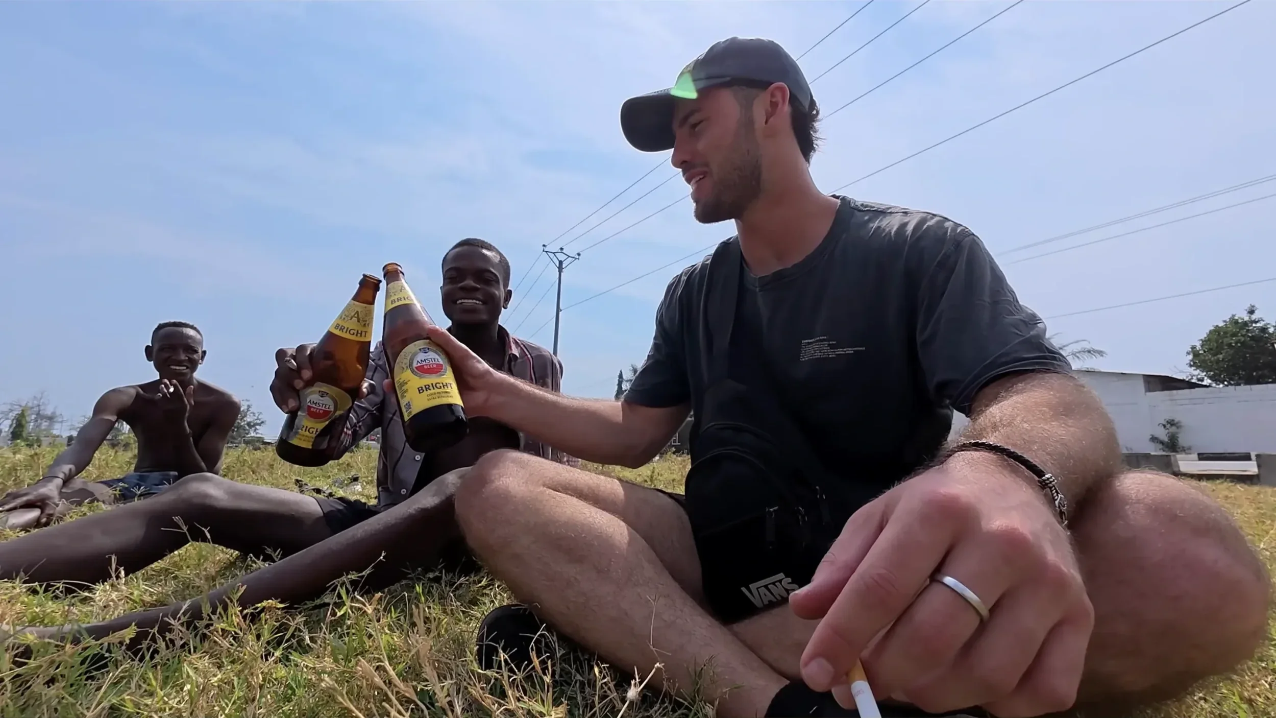 Drinking cold beer bottles near Lake Tanganyika