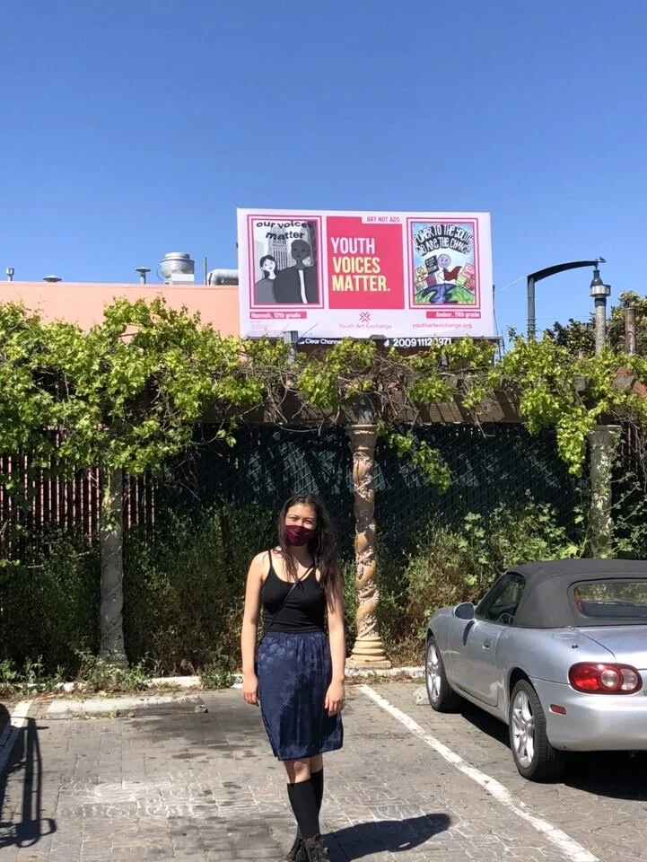 YAB member Nikki at the Bayshore and Sunnydale billboard