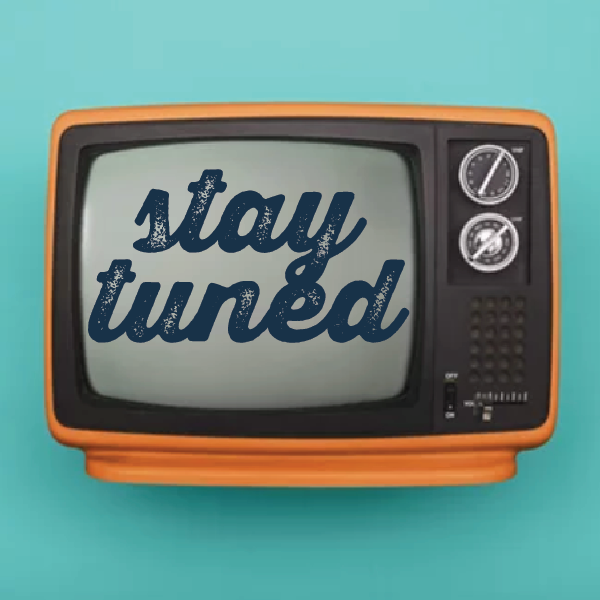 Retro television set with a message that says 'stay tuned' on the screen