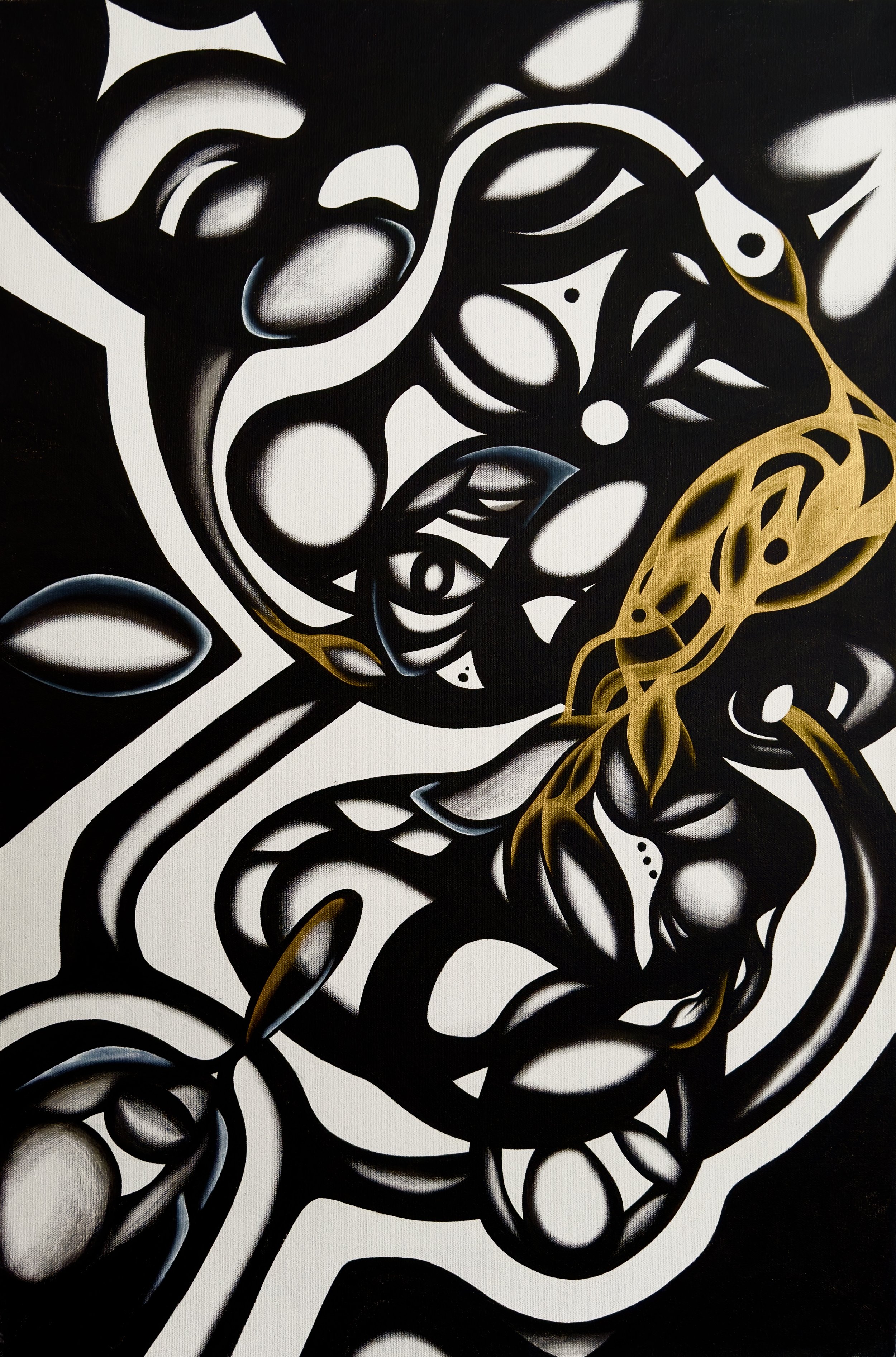 Abstract black and white mural with gold accents, featuring swirling shapes and eye-like figures.