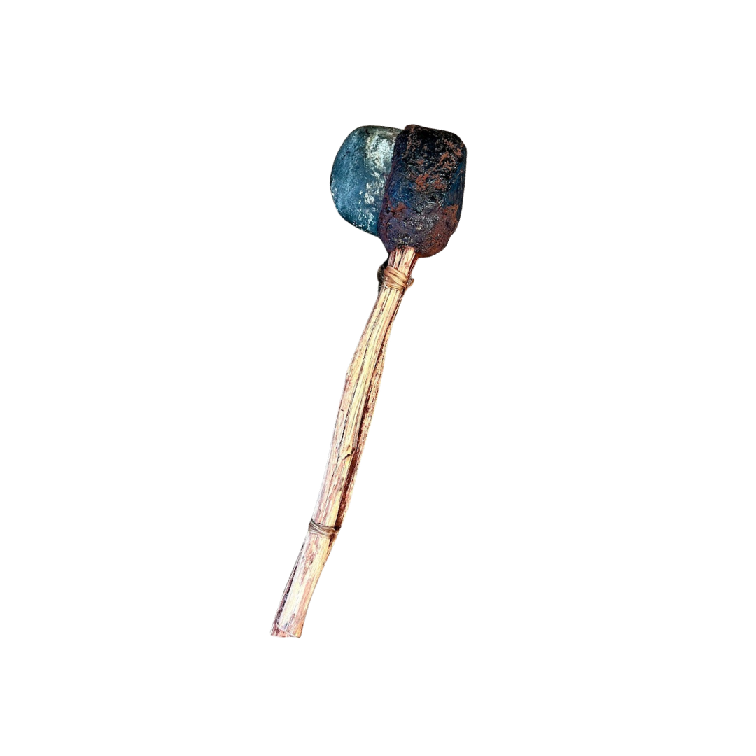 Close-up of a burnt matchstick with a charred head and a slightly bent wooden stick.