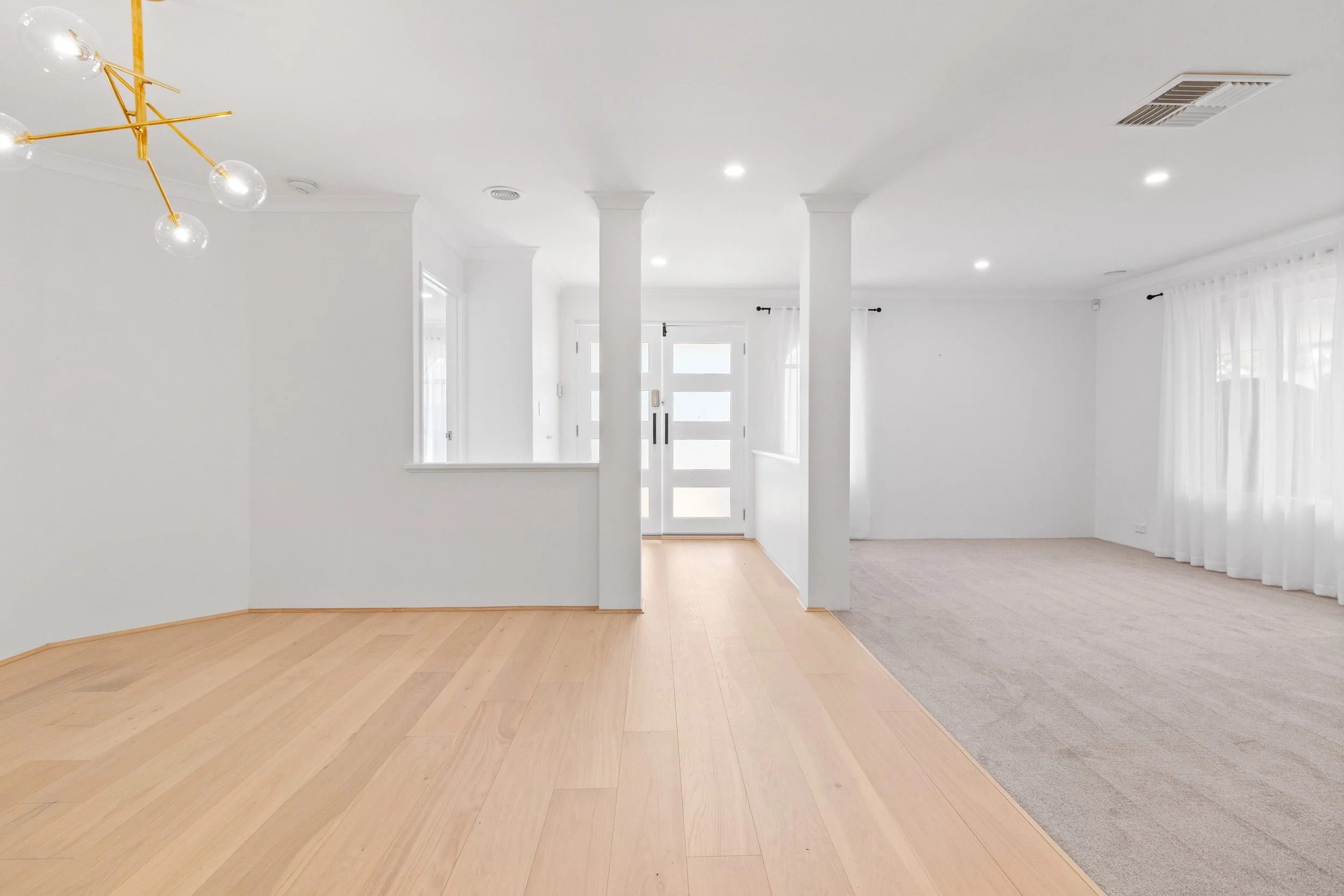 Light-filled living area of a Perth rental home documented before a tenancy begins