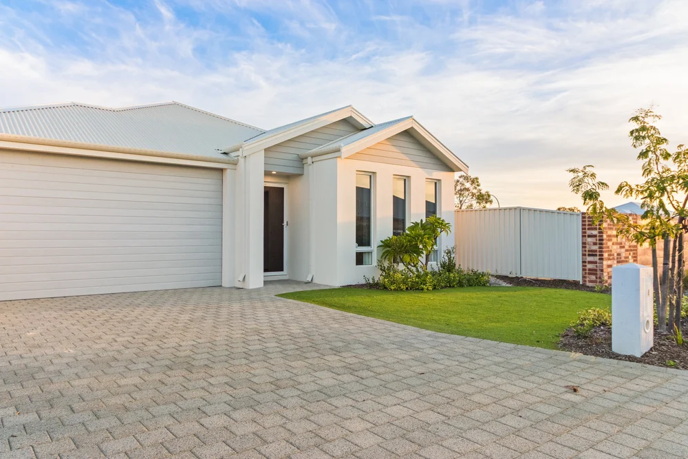 A Perth investment property at twilight, owned from interstate