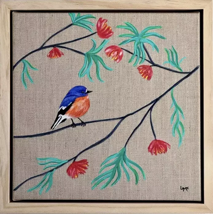 Flame Robin in Zen garden