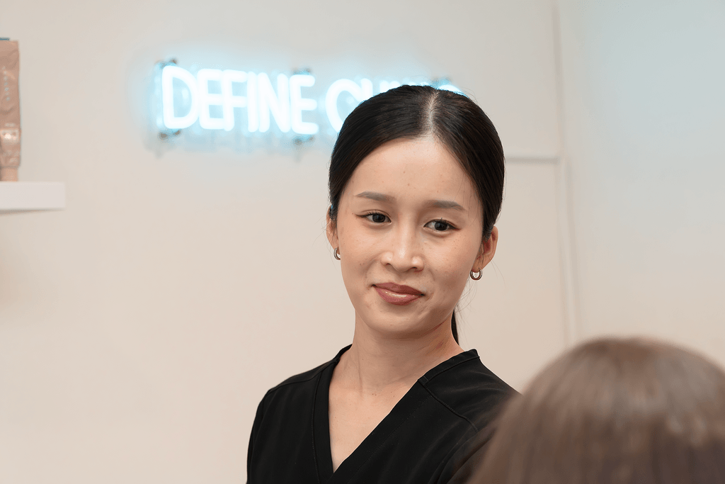 Nurse Tania Nguyen at Define Clinic consulting a patient
