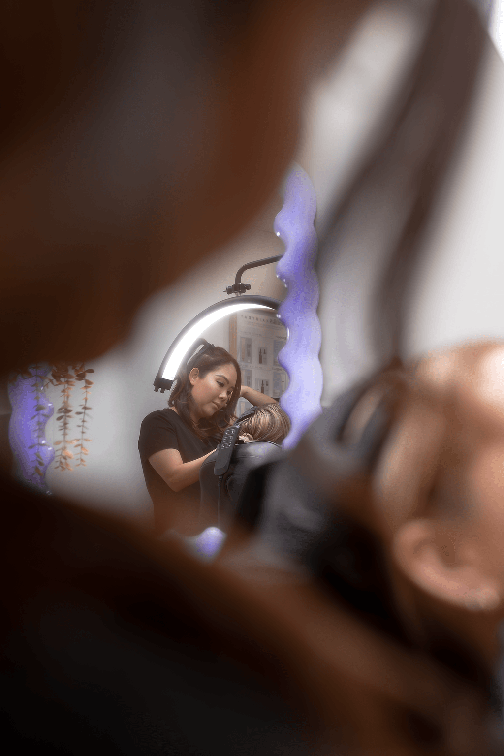 Nurse Nancy Drew at Define Clinic treating a patient