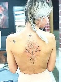 geometry back tattoo on girl in cabo san lucas mexico tattoos by kidd estudio de tatuajes en cabo san lucas