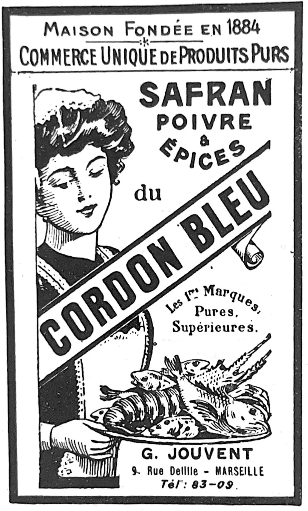 Ancien emballage de safran et épices avec une illustration d'une femme et un plateau de fruits de mer. Texte en français concernant une maison fondée en 1884, spécialisée en safrans purs, marque déposée Cordon Bleu, située à Marseille.