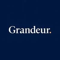 The word 'Grandeur' in white text on a dark blue background.