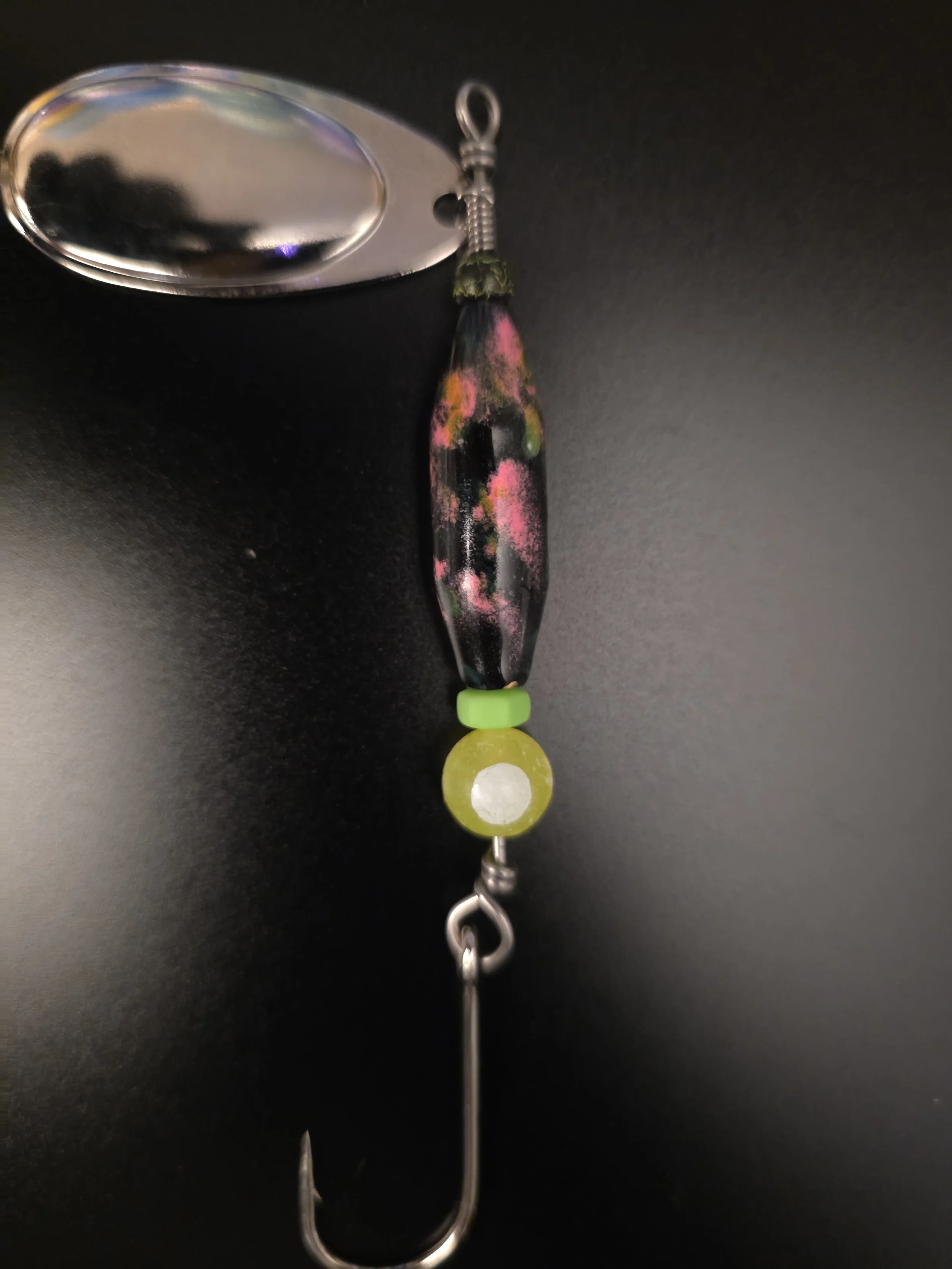 "Best 1/2 oz salmon, steelhead, and trout lure: Black Orchid custom spinner with tungsten crackle bead, double glow pink, and green chartreuse."