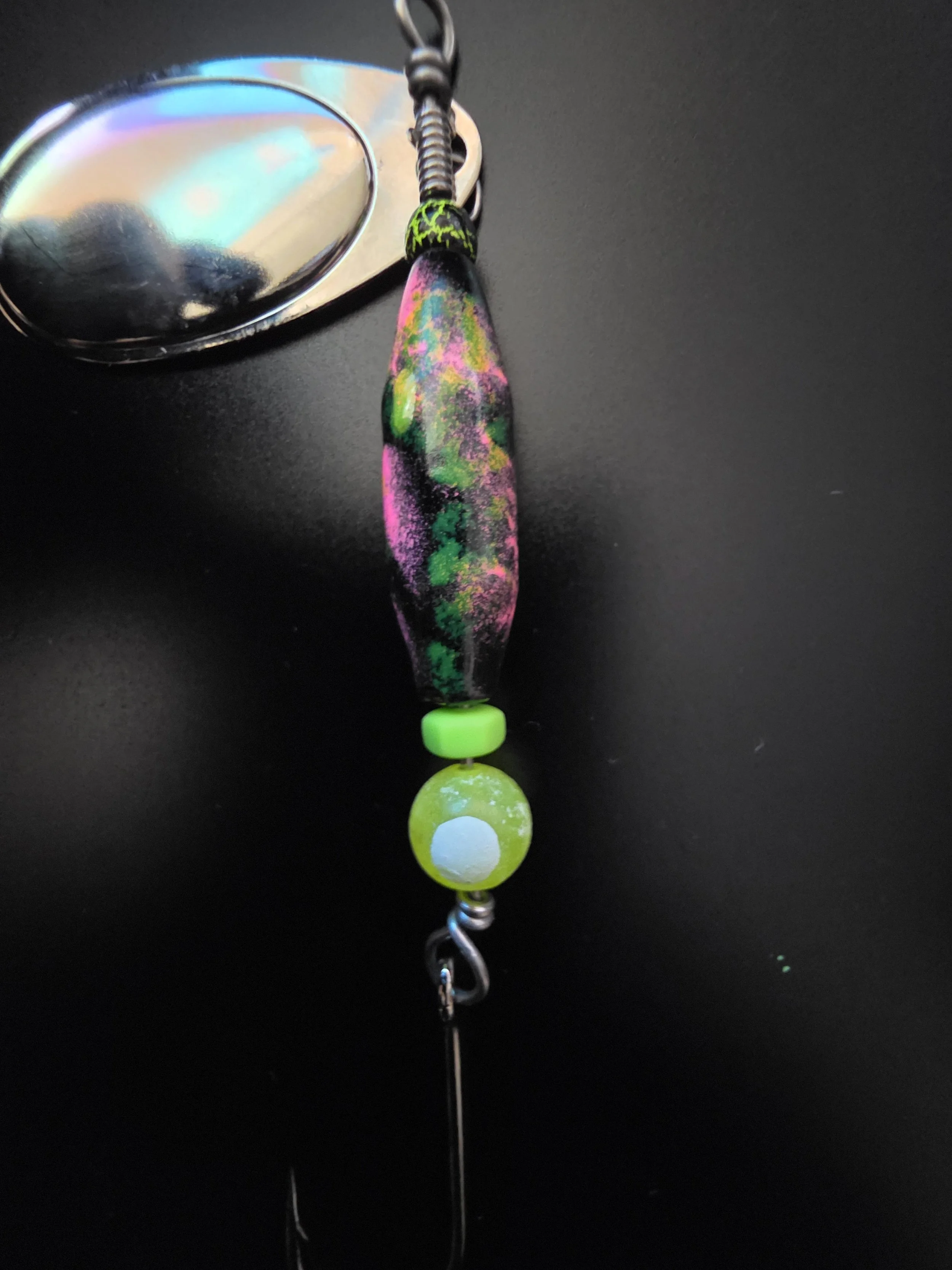 "Best 1/2 oz salmon, steelhead, and trout lure: Black Orchid custom spinner with tungsten crackle bead, double glow pink, and green chartreuse."
