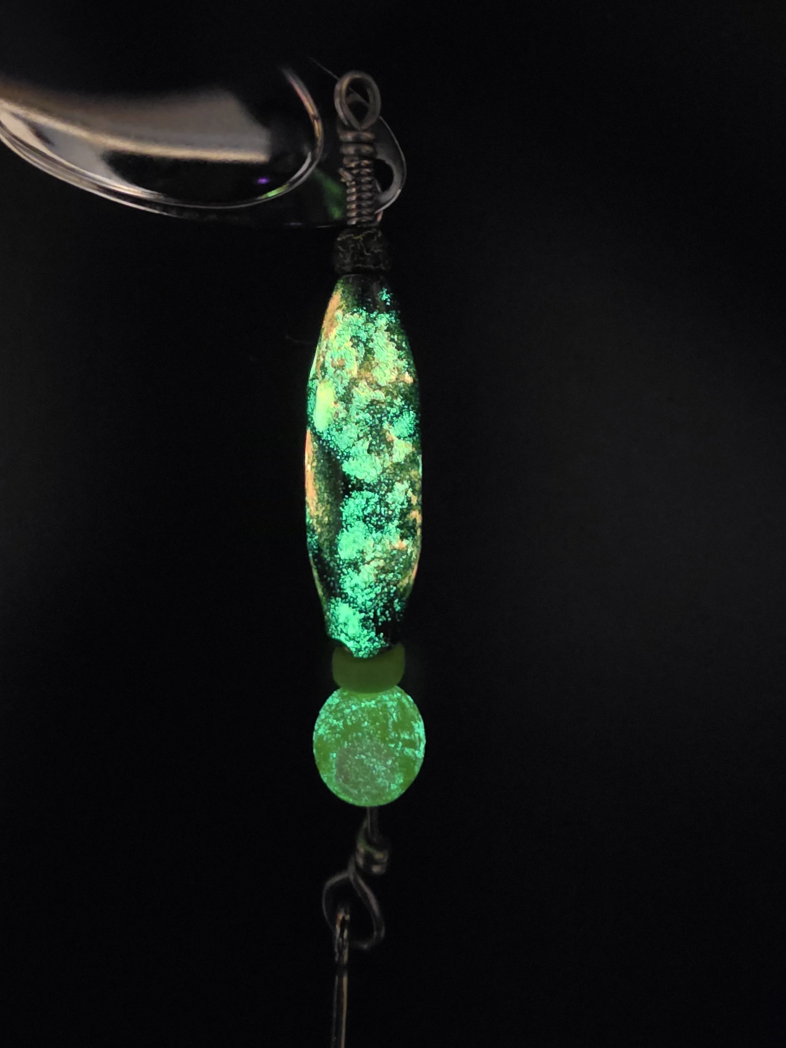 "Best 1/2 oz salmon, steelhead, and trout lure: Black Orchid custom spinner with tungsten crackle bead, double glow pink, and green chartreuse."