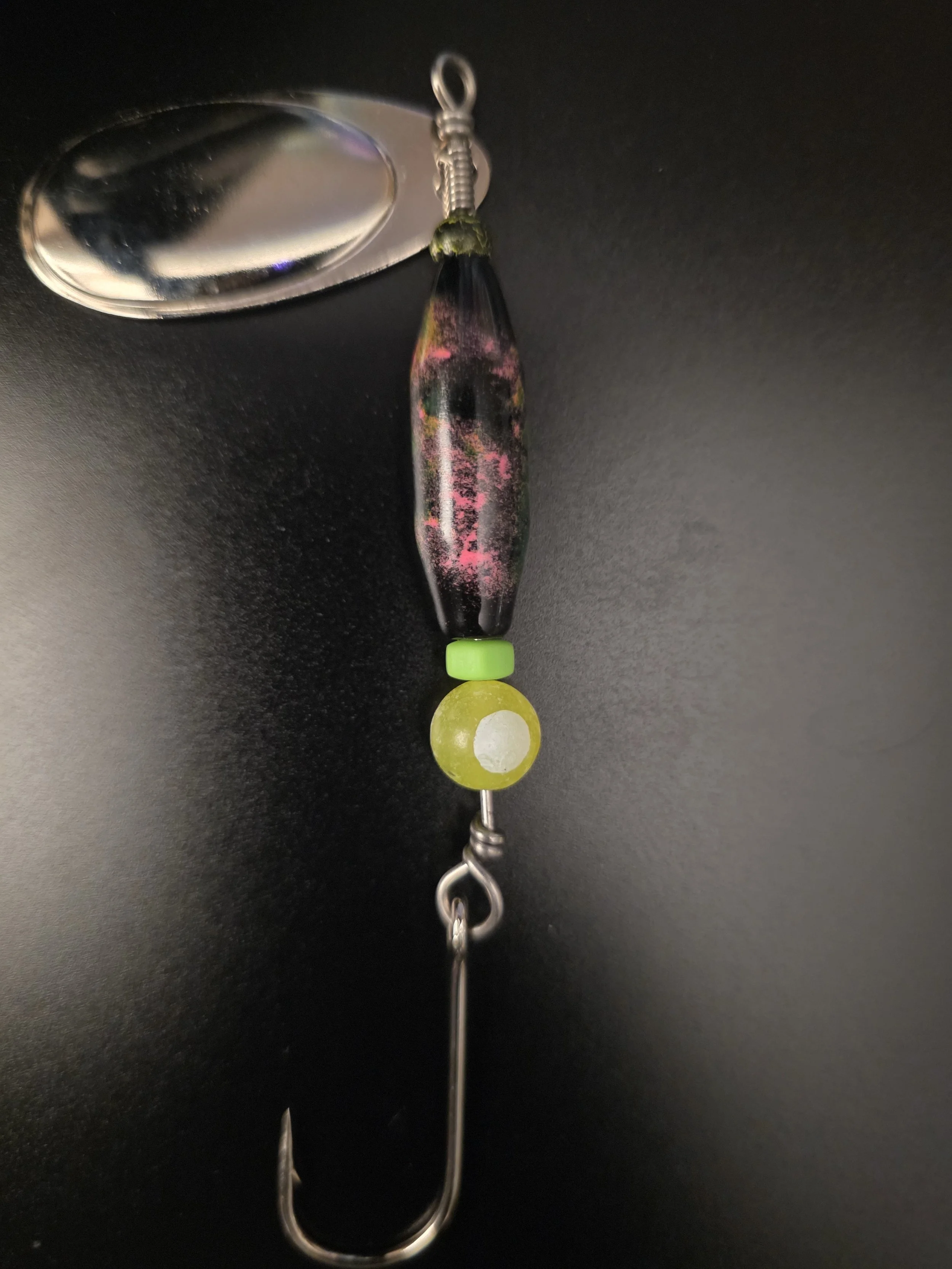 "Best 1/2 oz salmon, steelhead, and trout lure: Black Orchid custom spinner with tungsten crackle bead, double glow pink, and green chartreuse."