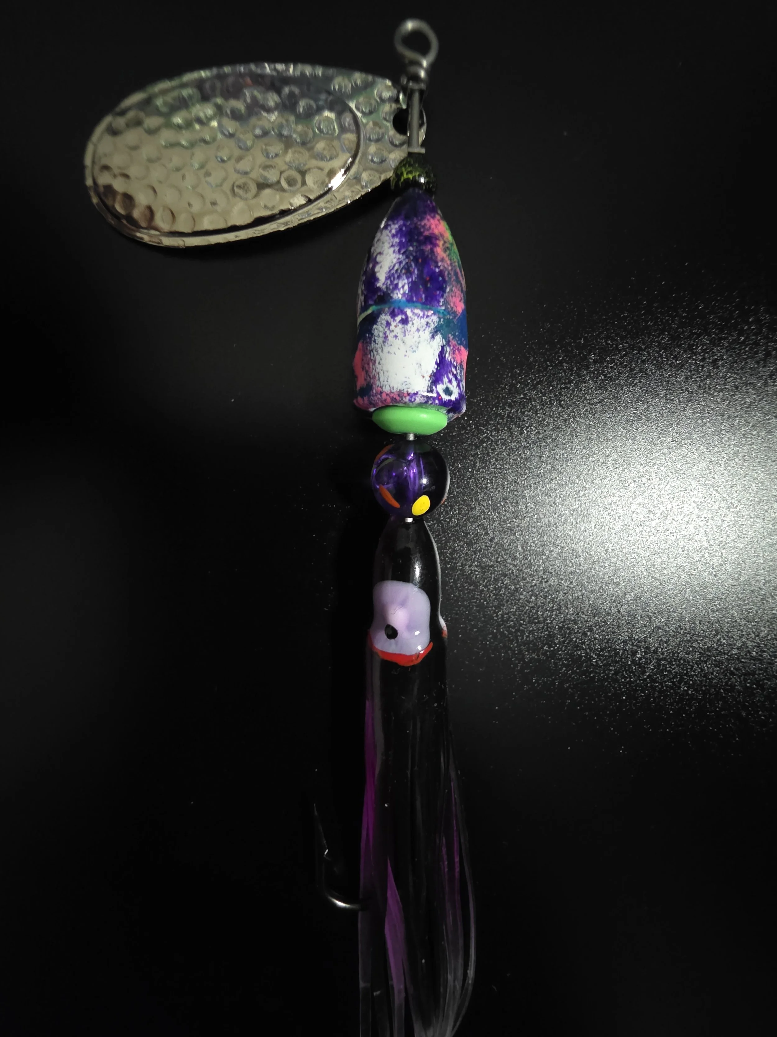 Side view of the 3/4 oz KAMAKAZI Electric Purple custom lure showing the mixed violet and purple paint gradient.