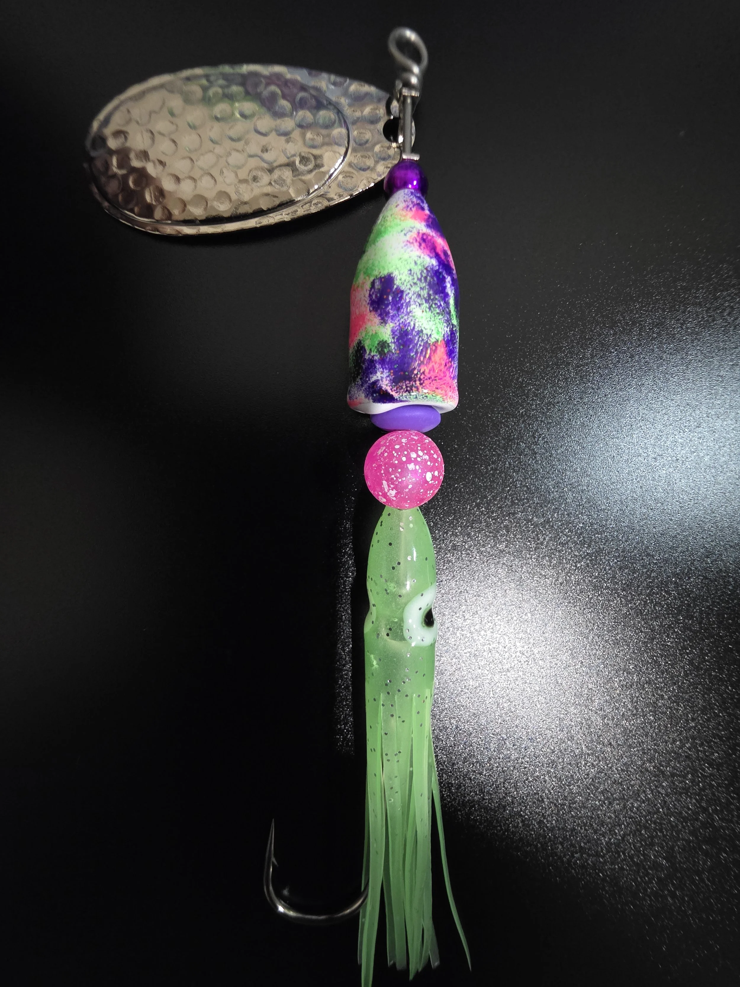 Kamakazi Graffiti 3/4 oz custom fishing spinner with chrome blades and a hand-painted glow hot pink, chartreuse, and sparkle purple body.