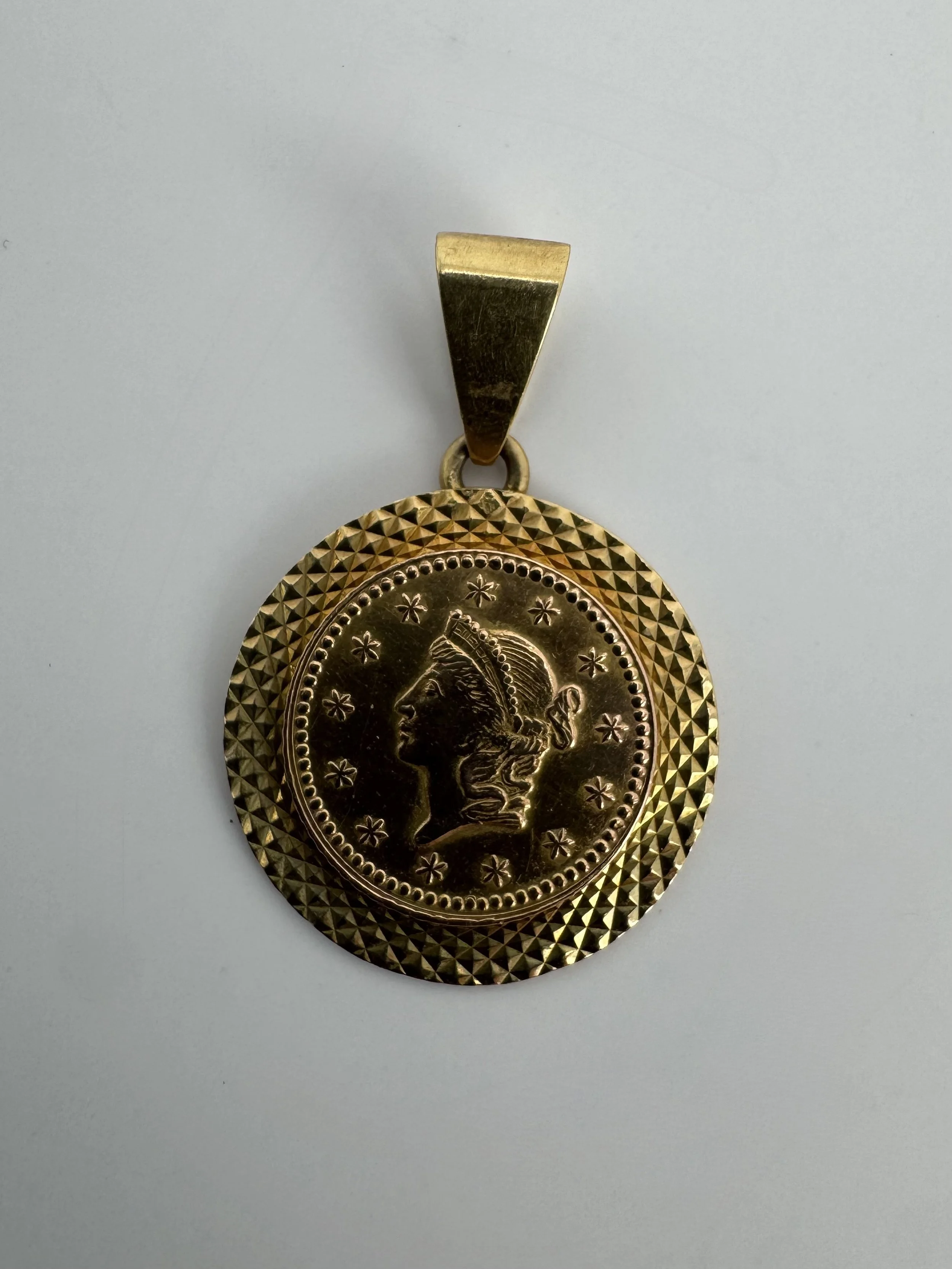 18 carat gold caesar coin pendant
