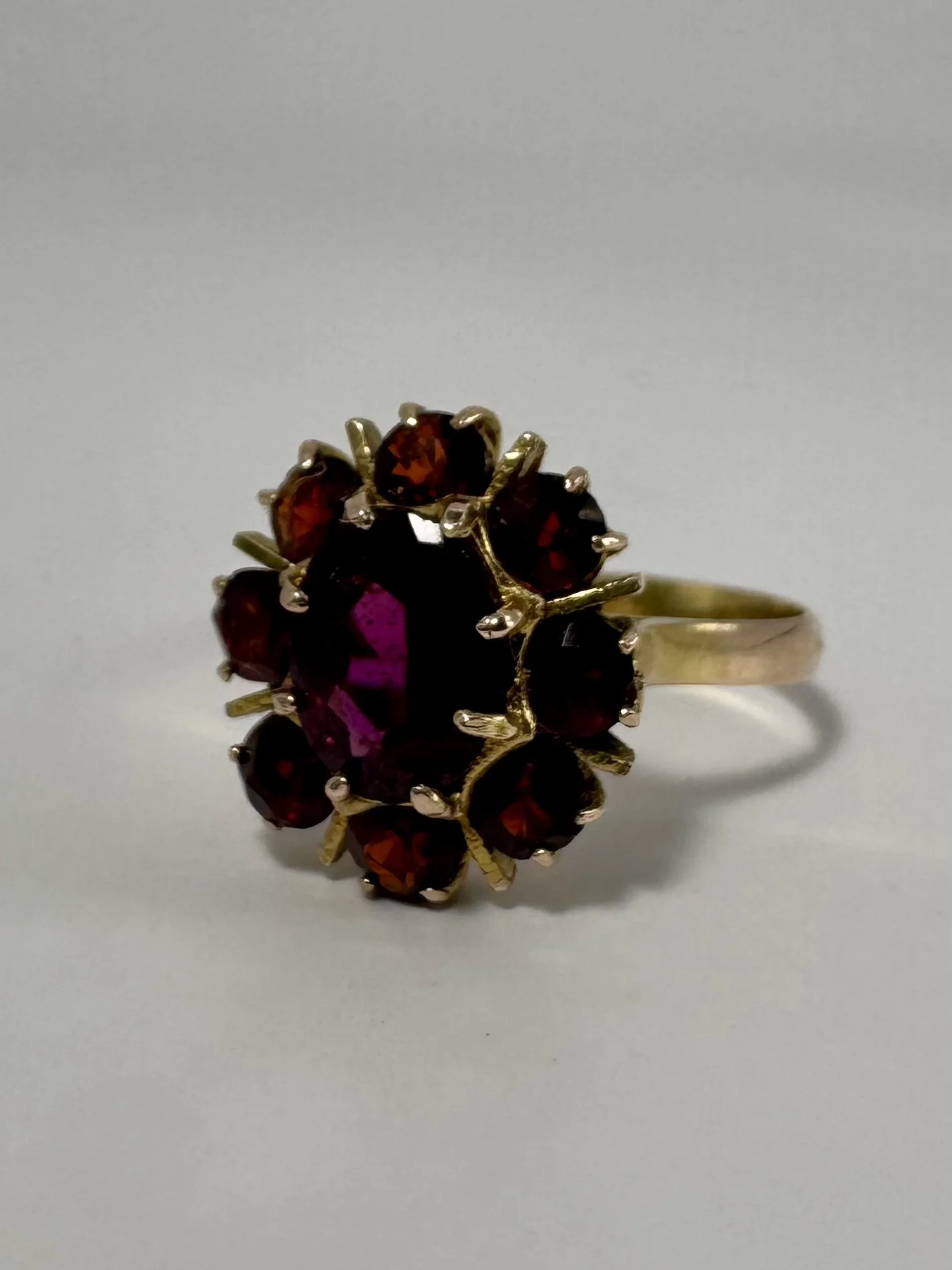 Golden cluster garnet ring