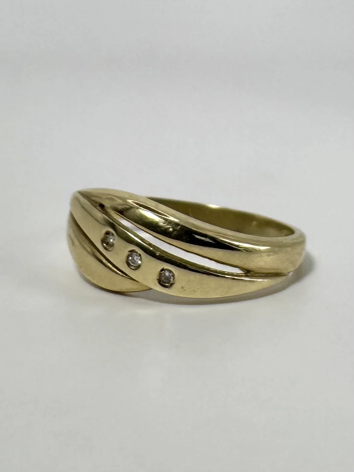 Golden ring with diamonds