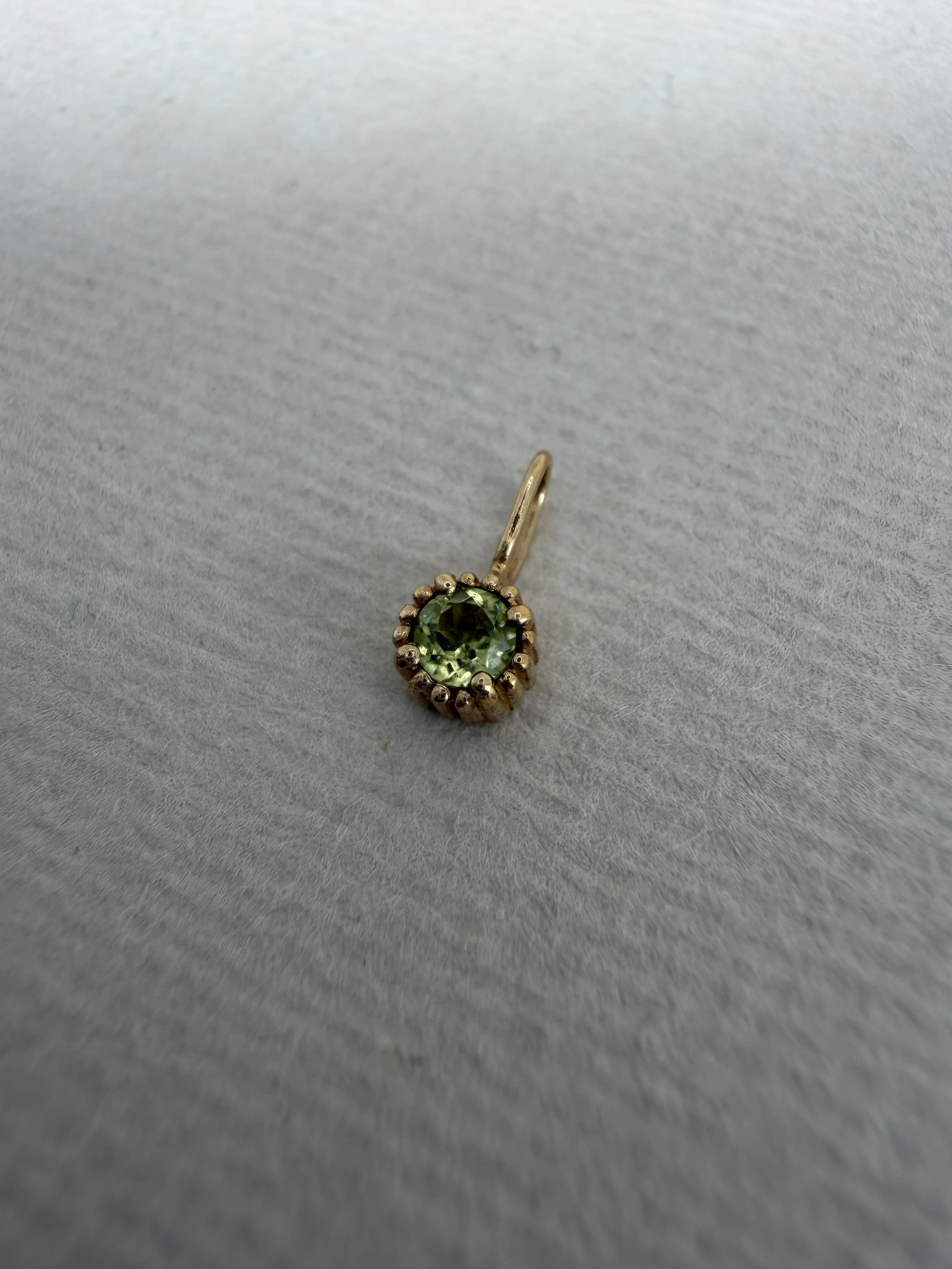 14 carat gold peridot charm