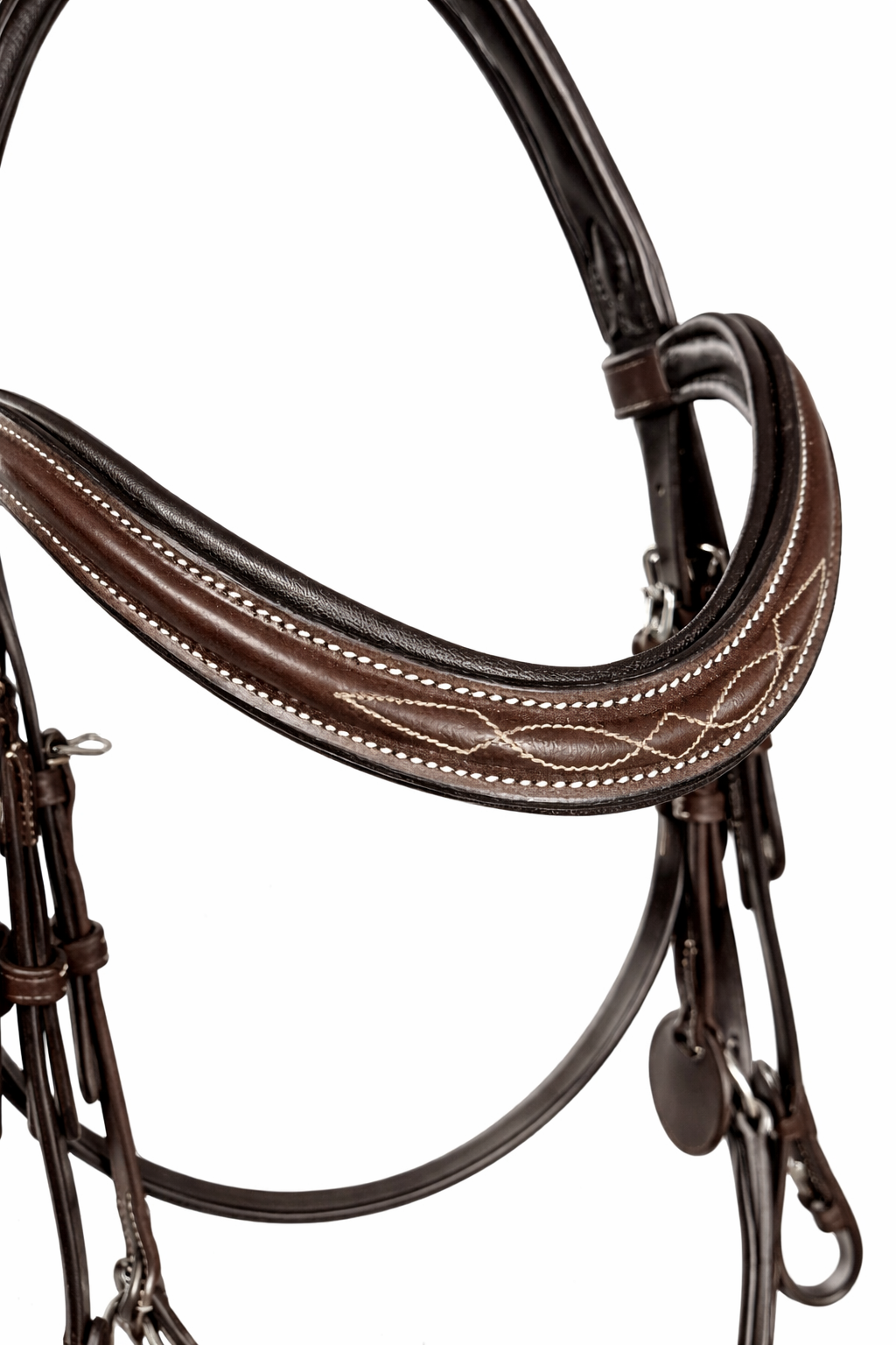Close-up of brown anatomical grackle bridle browband with fancy stitching 