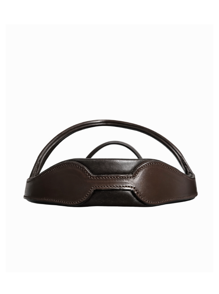 top detail of brown anatomical bridle headpiece with curved padding
