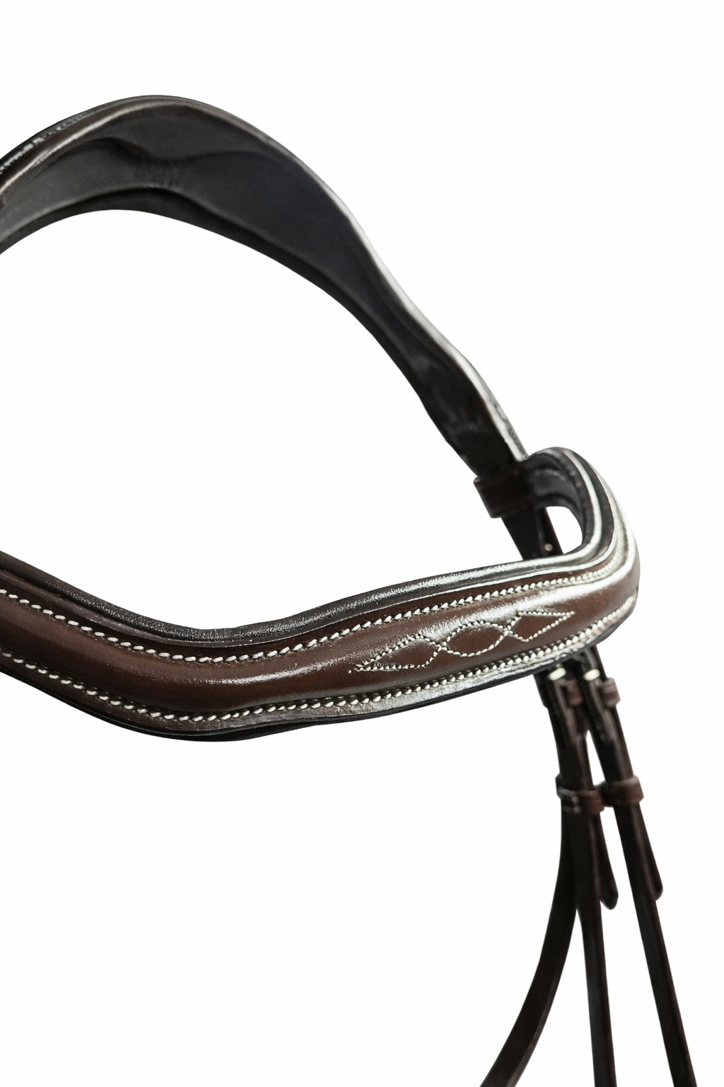 Close-up of brown anatomical bridle browband with fancy stitching