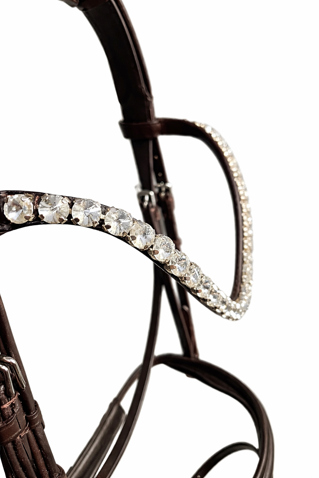 Close-up of brown anatomical bridle browband with big white crystals