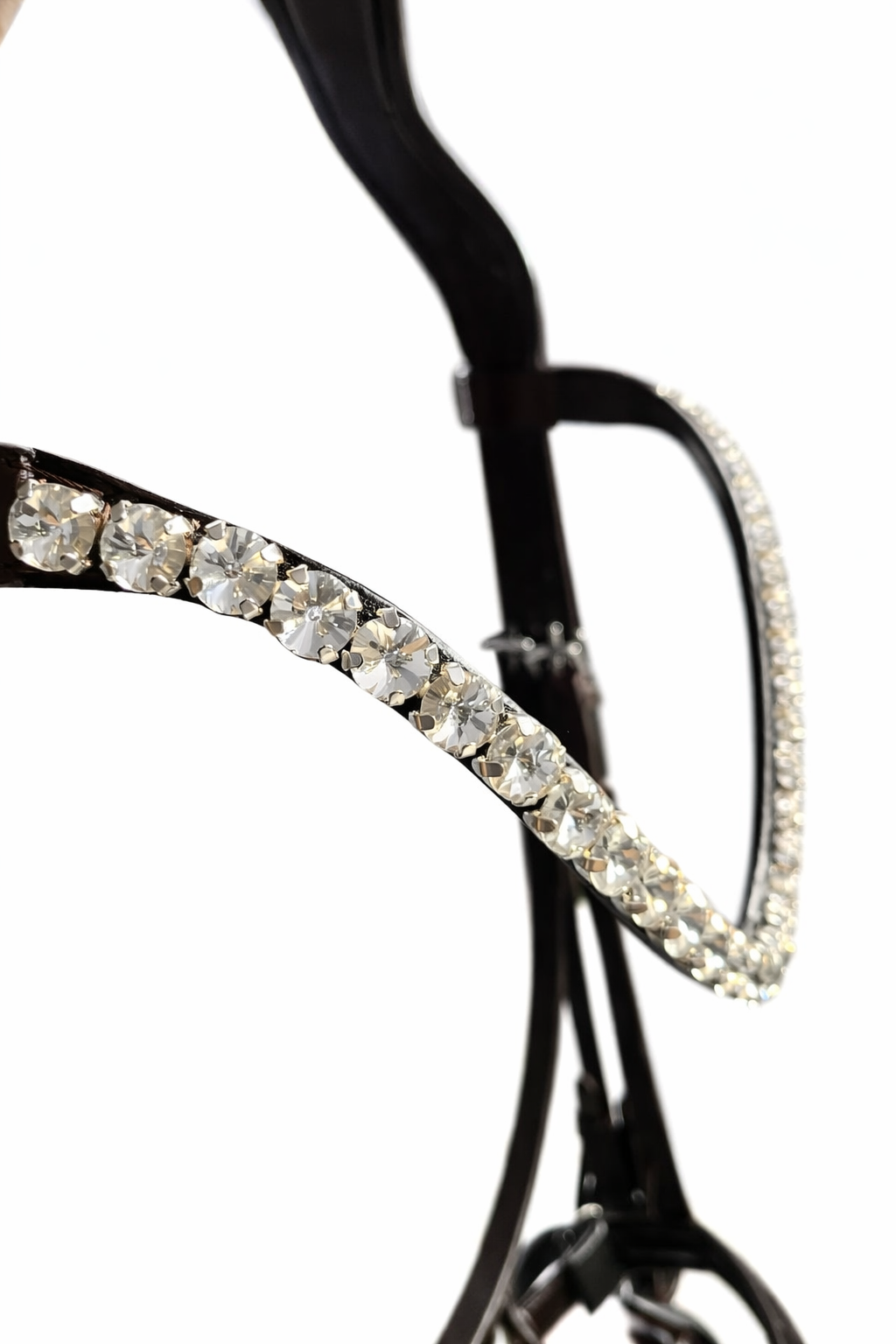 Close-up of brown anatomical bridle browband with clear crystals