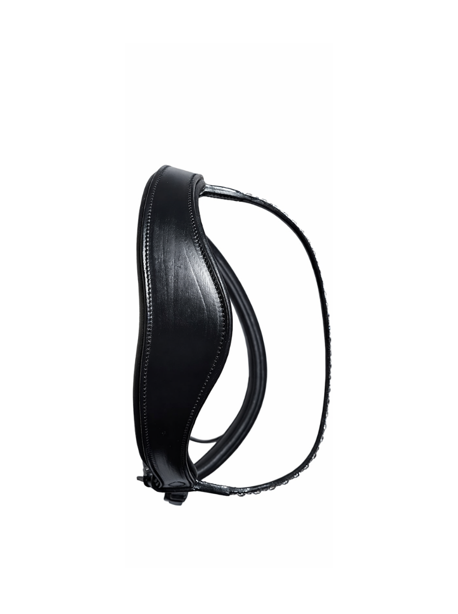 top detail of black anatomical bridle headpiece with curved padding
