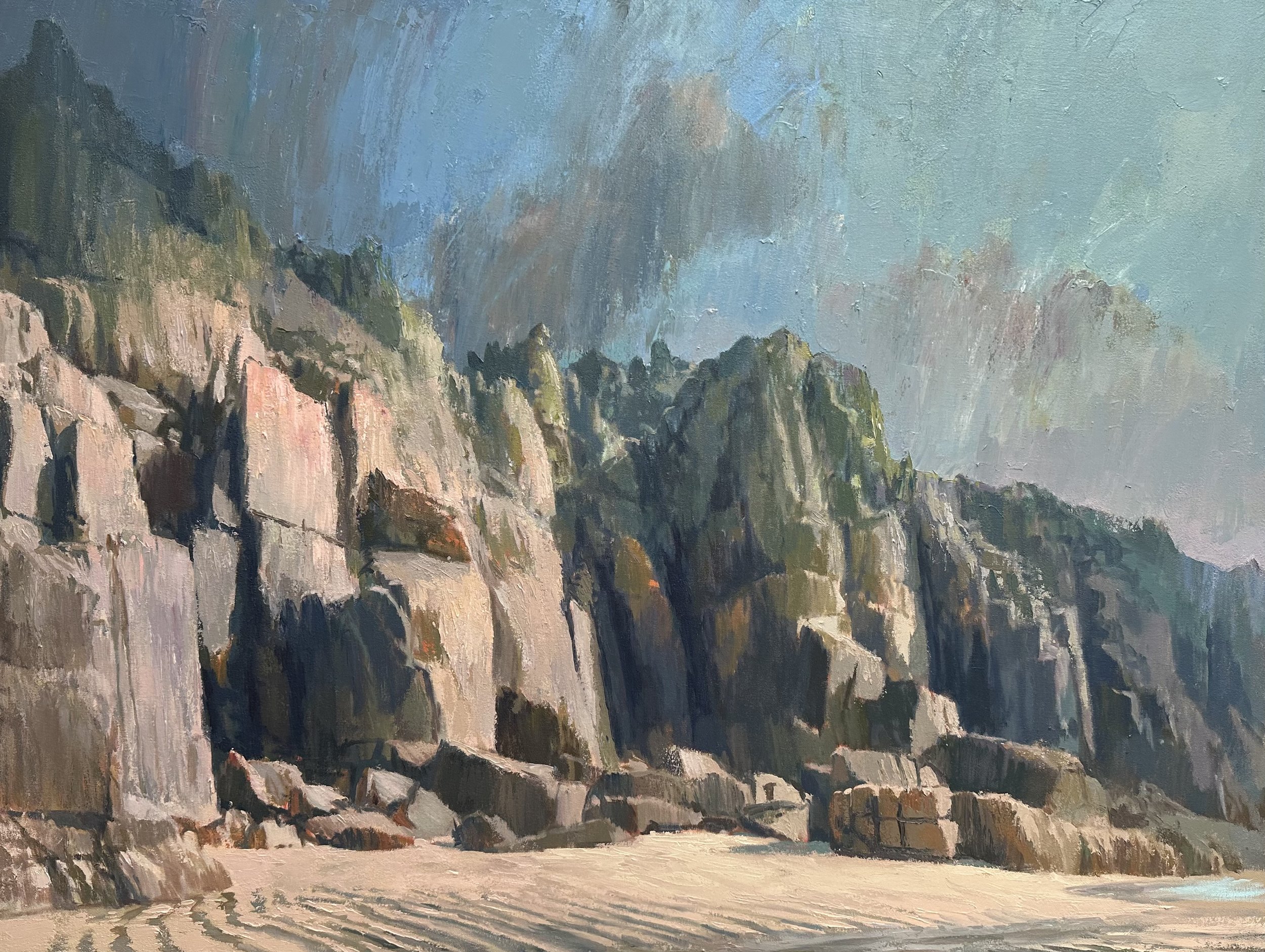 An oil painting of a scenic coastal landscape with rocky cliffs, sandy beach, and the ocean in the background under a partly cloudy sky.