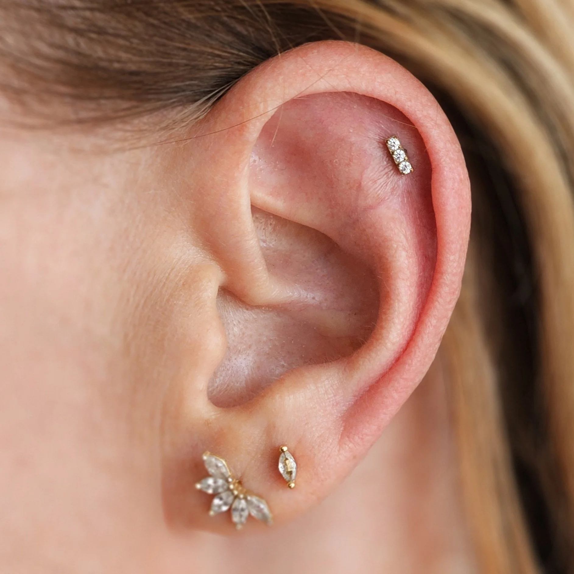 Minimalist ear piercing, Helix and earlobe piercing. 